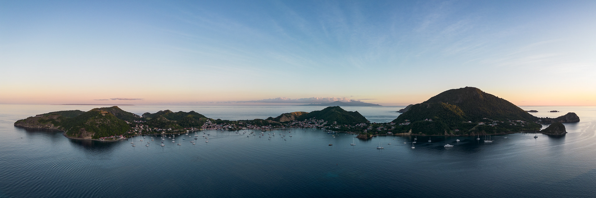 Terre-de-Haute from the air one beautiful evening. Note Dominica in the background, about 20 miles away