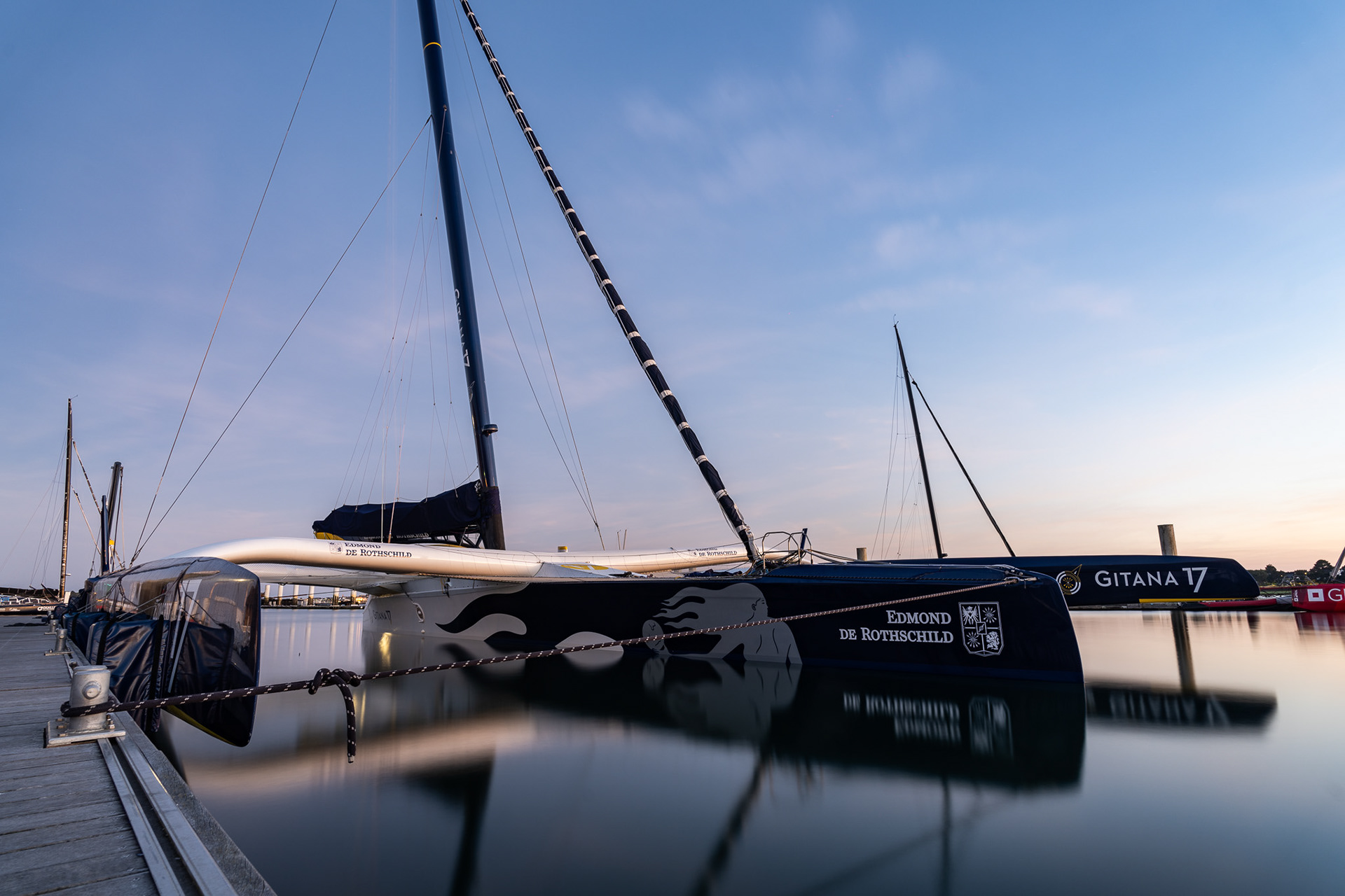 Gitana, the maxi ultim trimaran skippered by Charles Caudrelier, peacefully sits at the dock