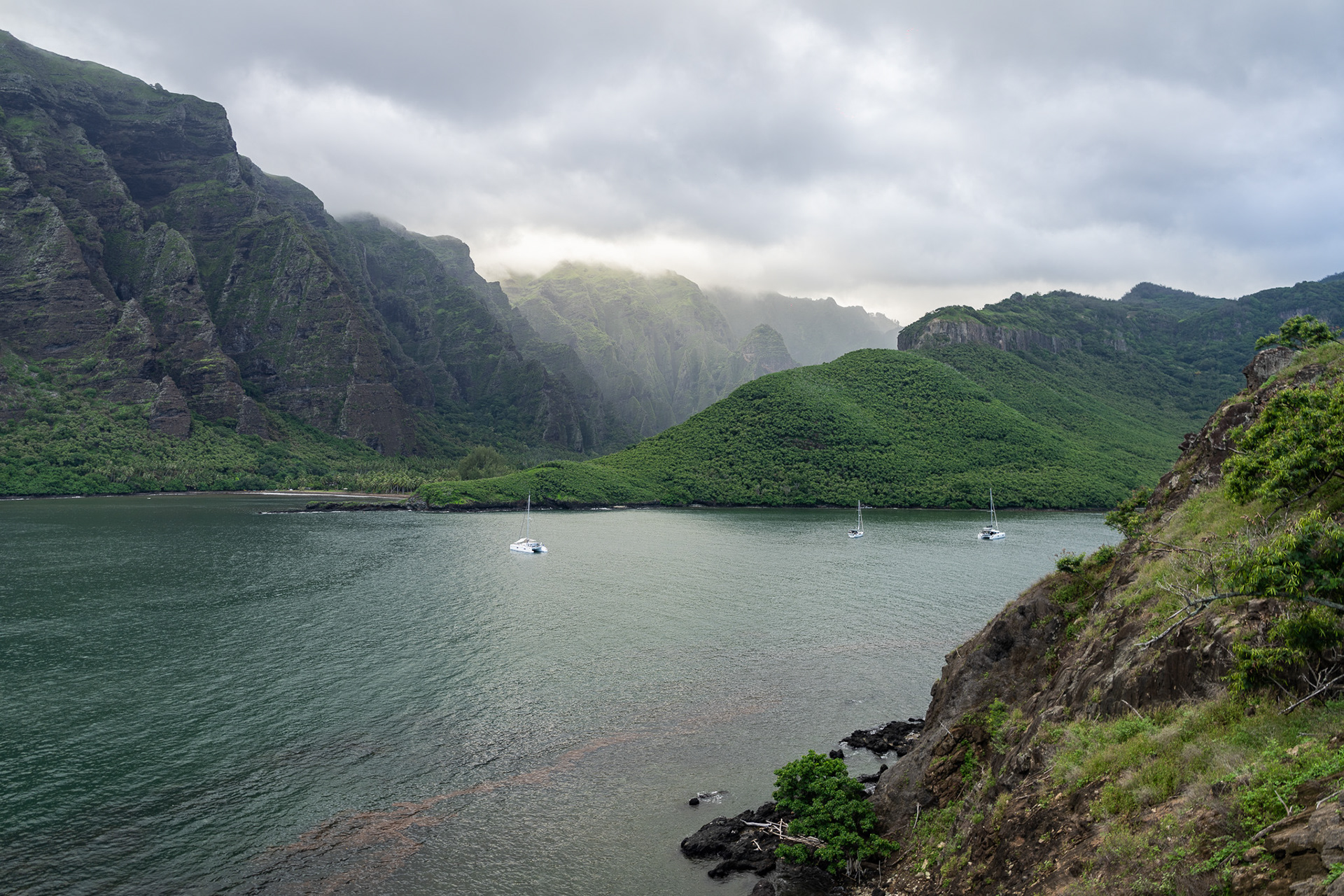 The most serene anchorage yet, named Hakatea and situated just a few miles west of Taiohae