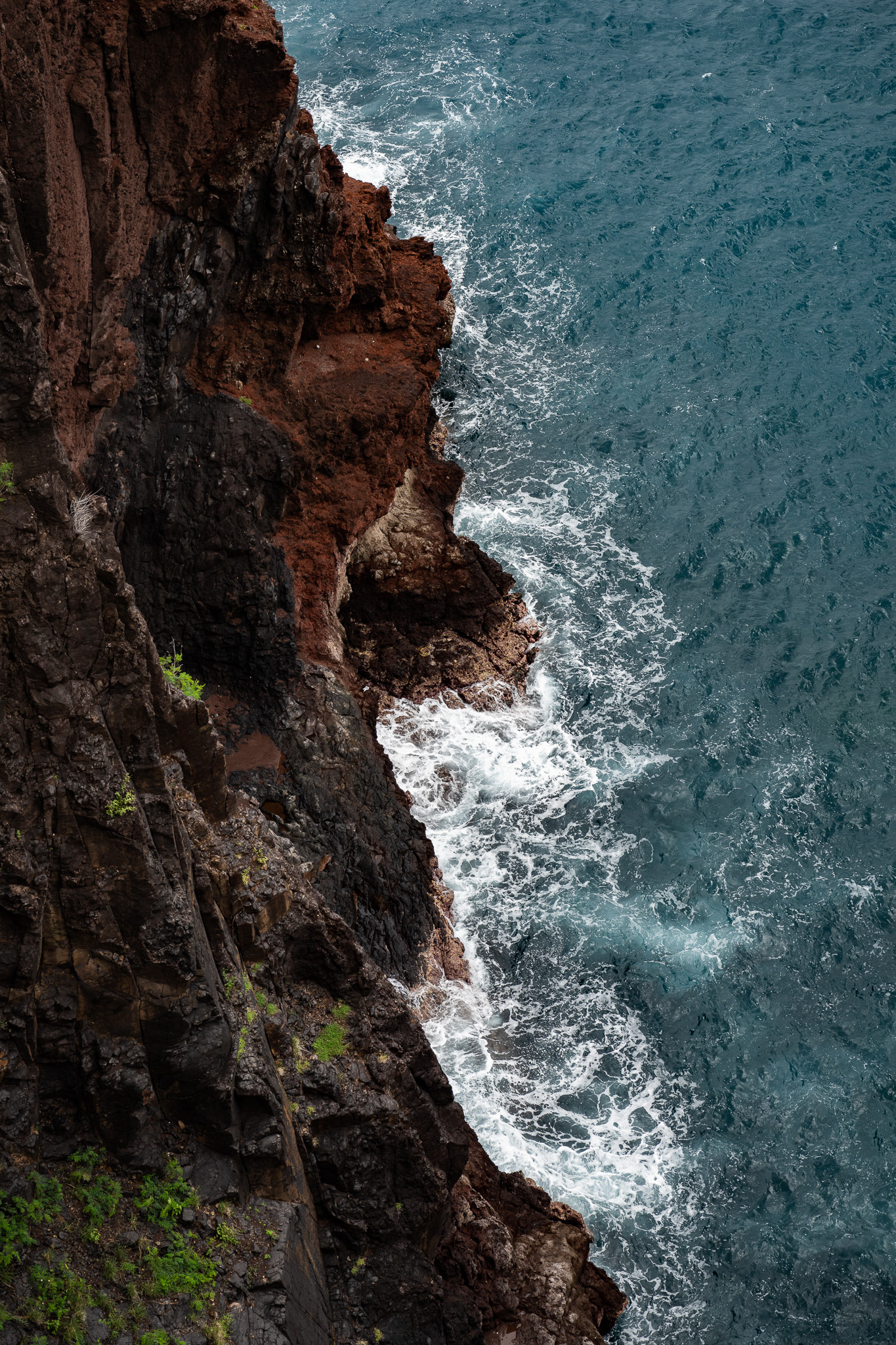 White water swirls around the rocky terrain