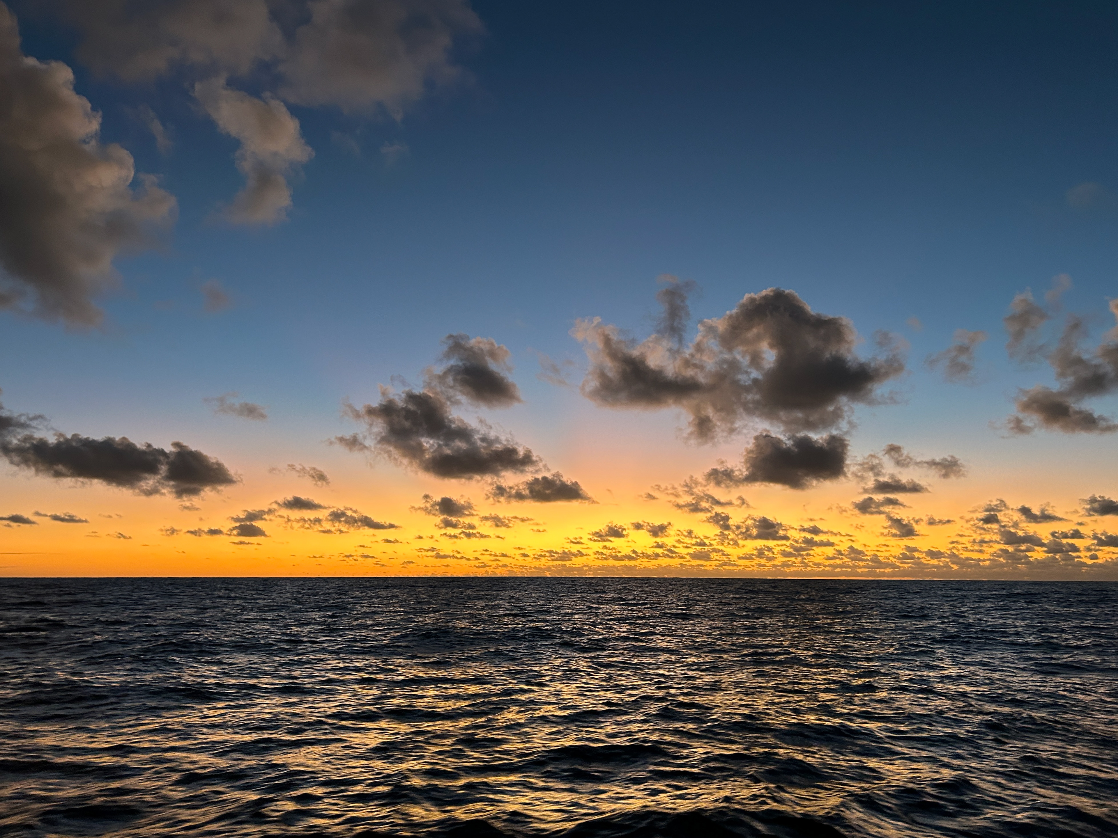 A glowing sunrise at sea