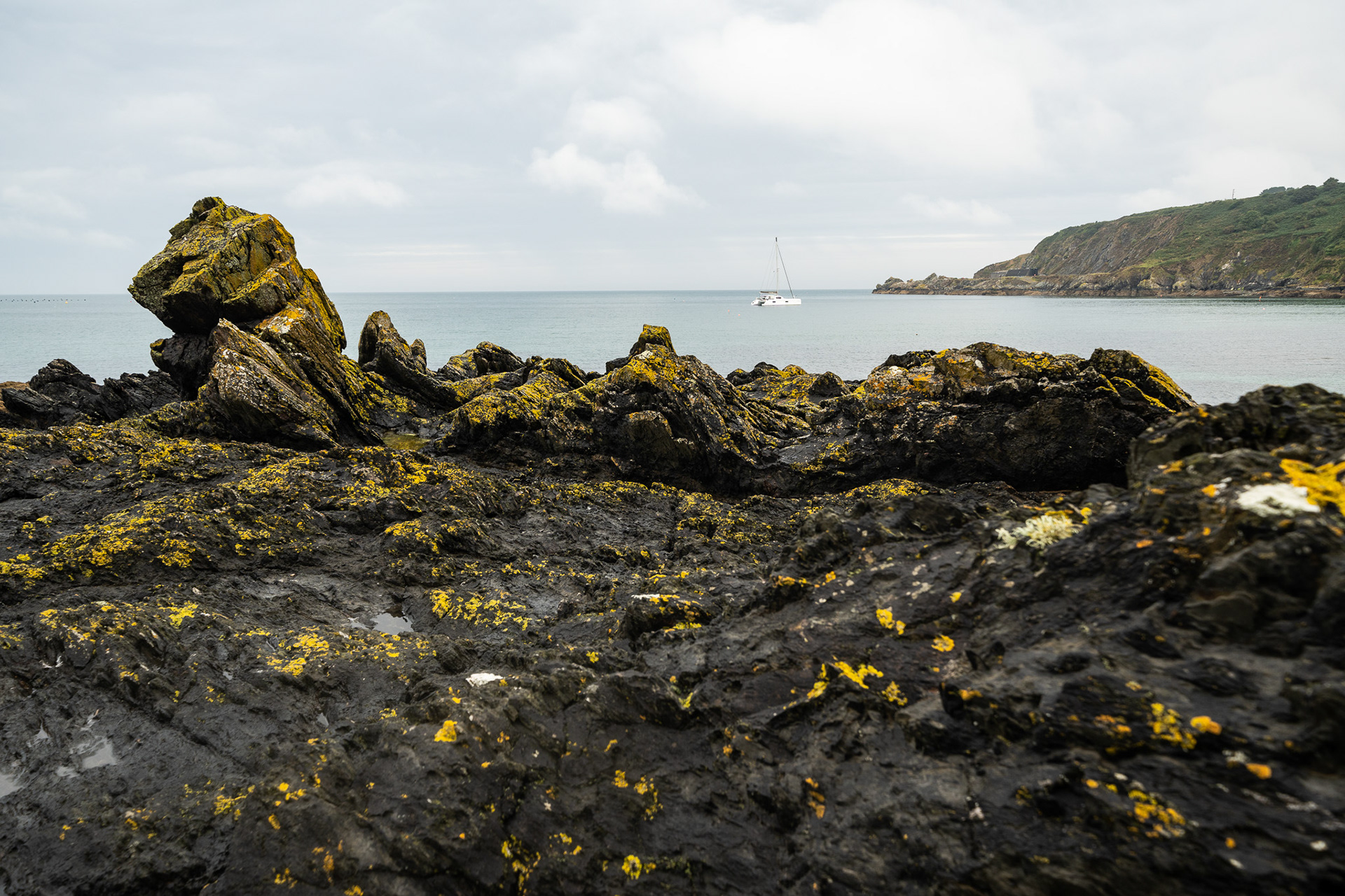 Stardust sits at anchor in Porthallow, England