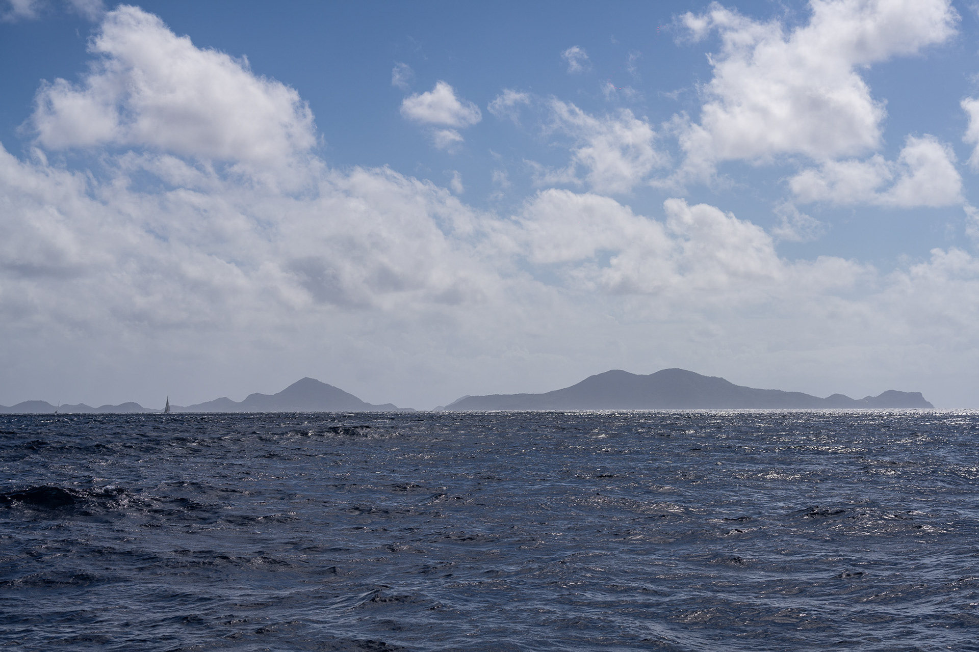 Leaving Les Saintes to the south as we sail to the west coast of Guadeloupe