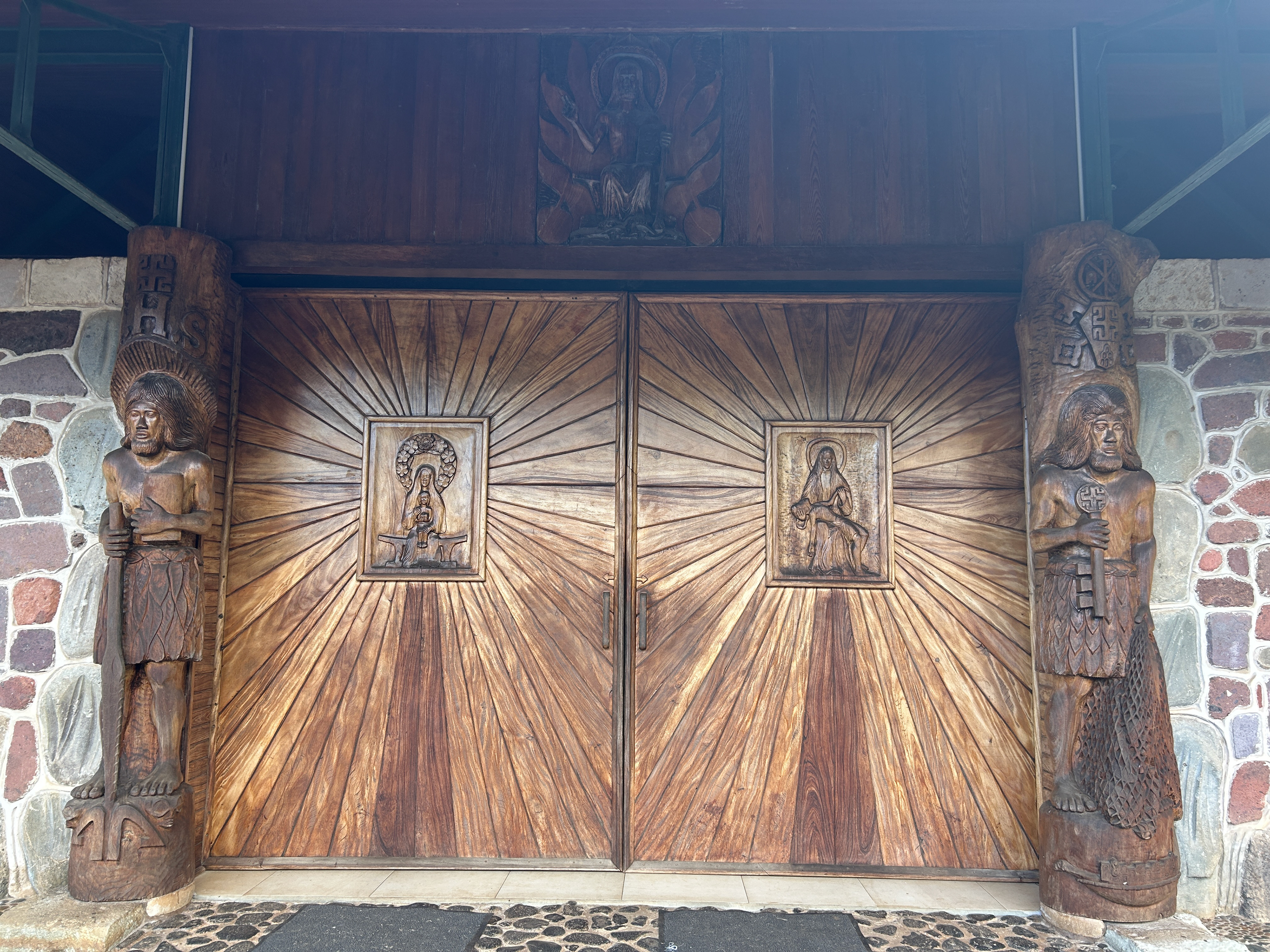 The giant carved wooden doors to the island’s church