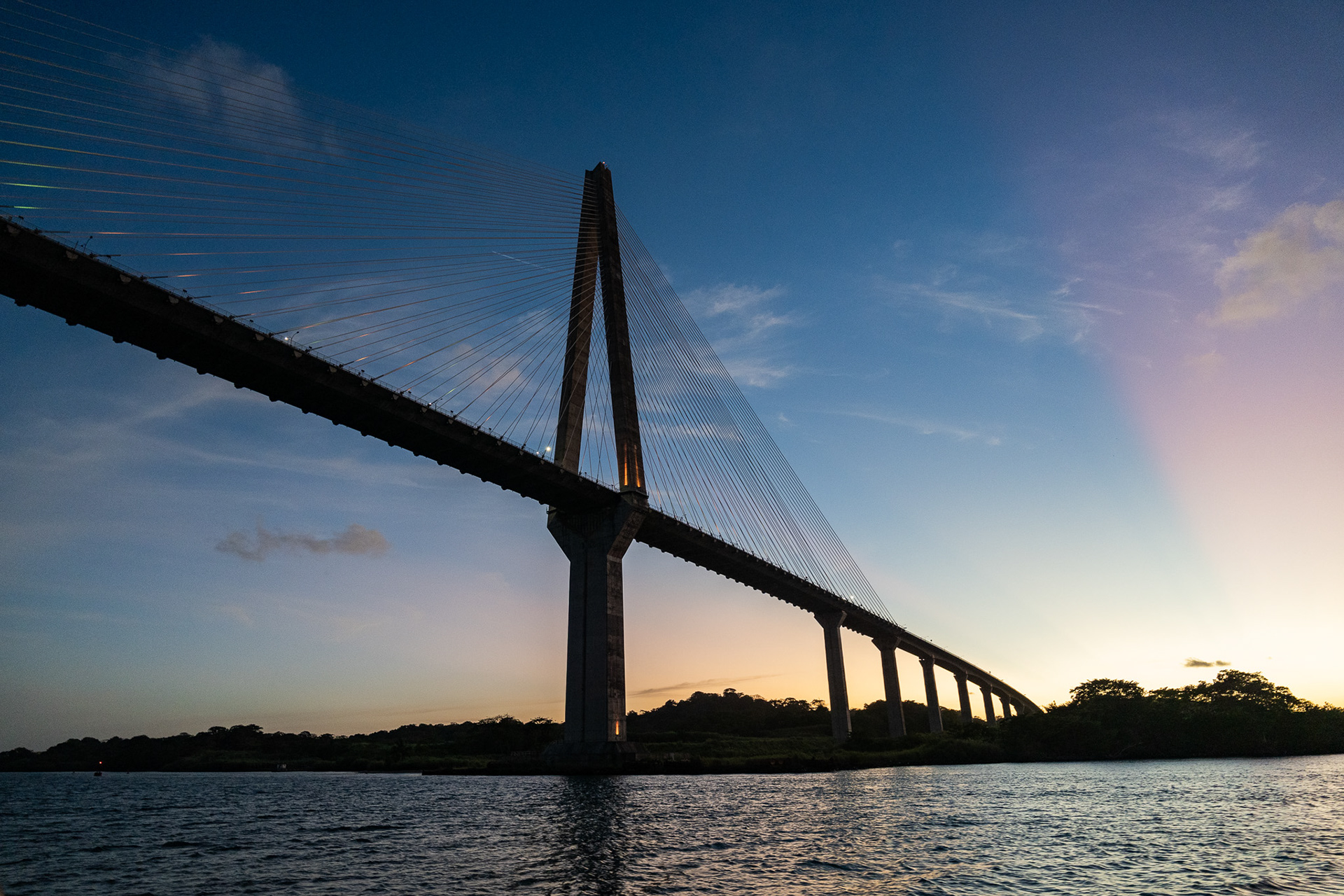 Crossing under the Puente Atlántico as we motor to the Panama Canal entrance