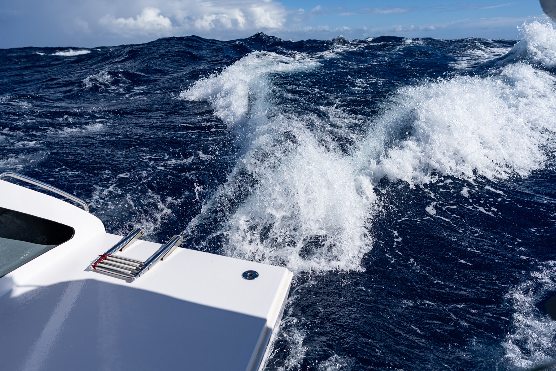 A giant wake from surfing down a wave at 15+ knots