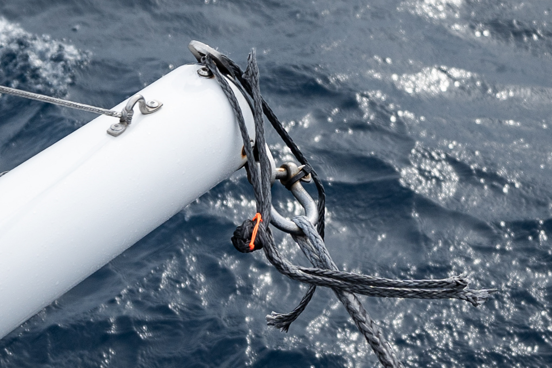 An unsuccessful repair on our bowsprit - this dyneema soft shackle lasted barely five hours before chafing through