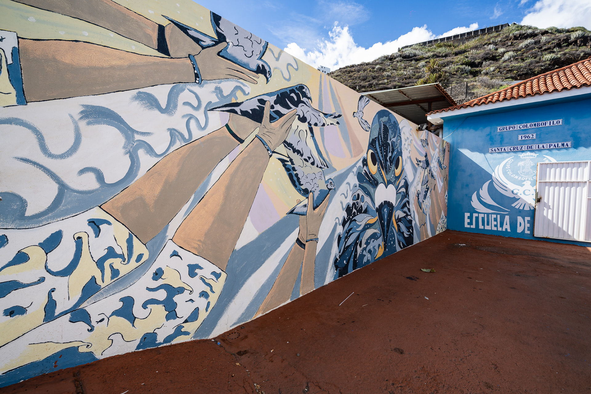 A stunning mural painted outside of a local school