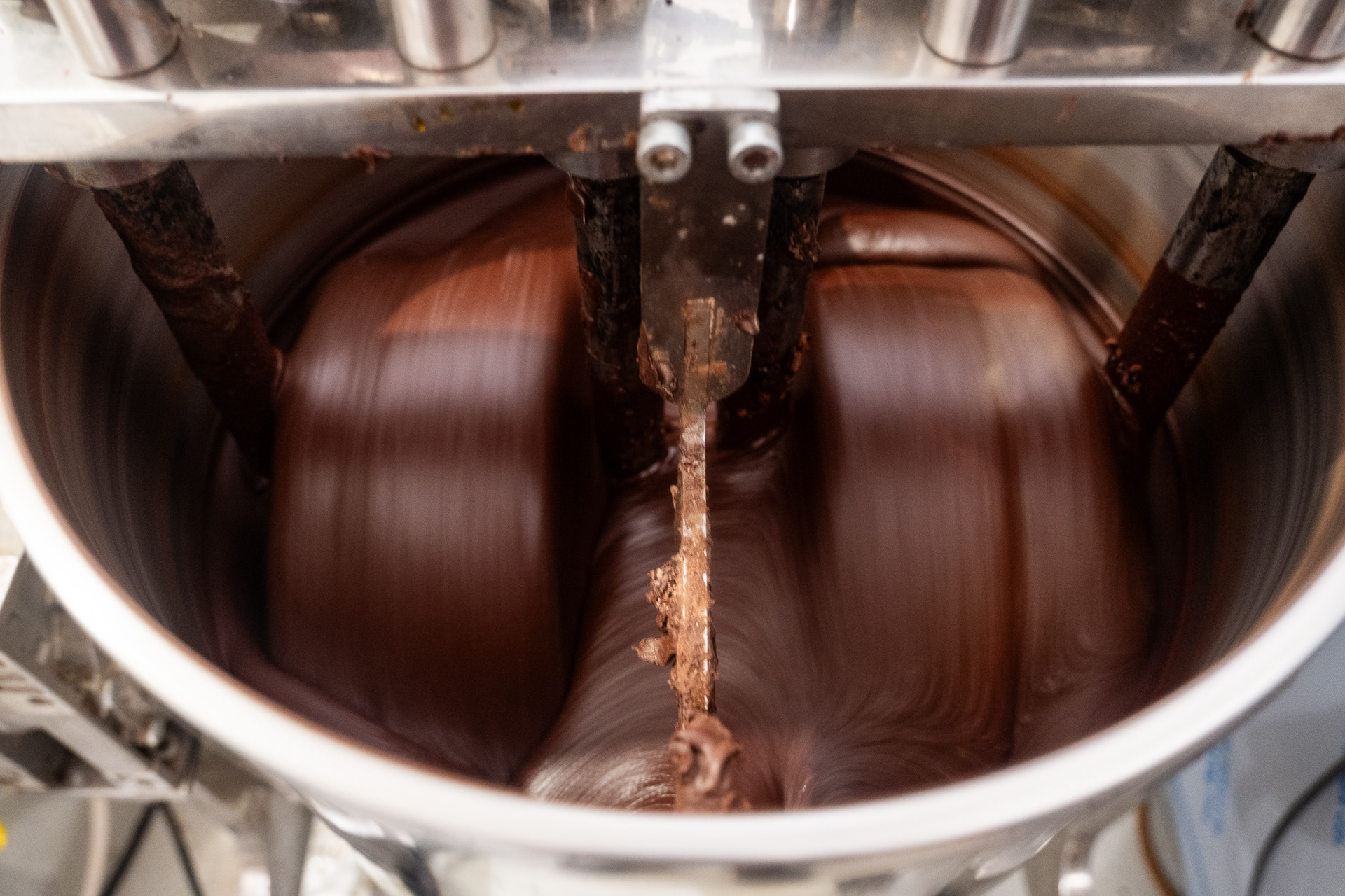 Once roasted and cracked, the nibs spend several days in this drum as they are ground finer and finer, eventually becoming chocolate