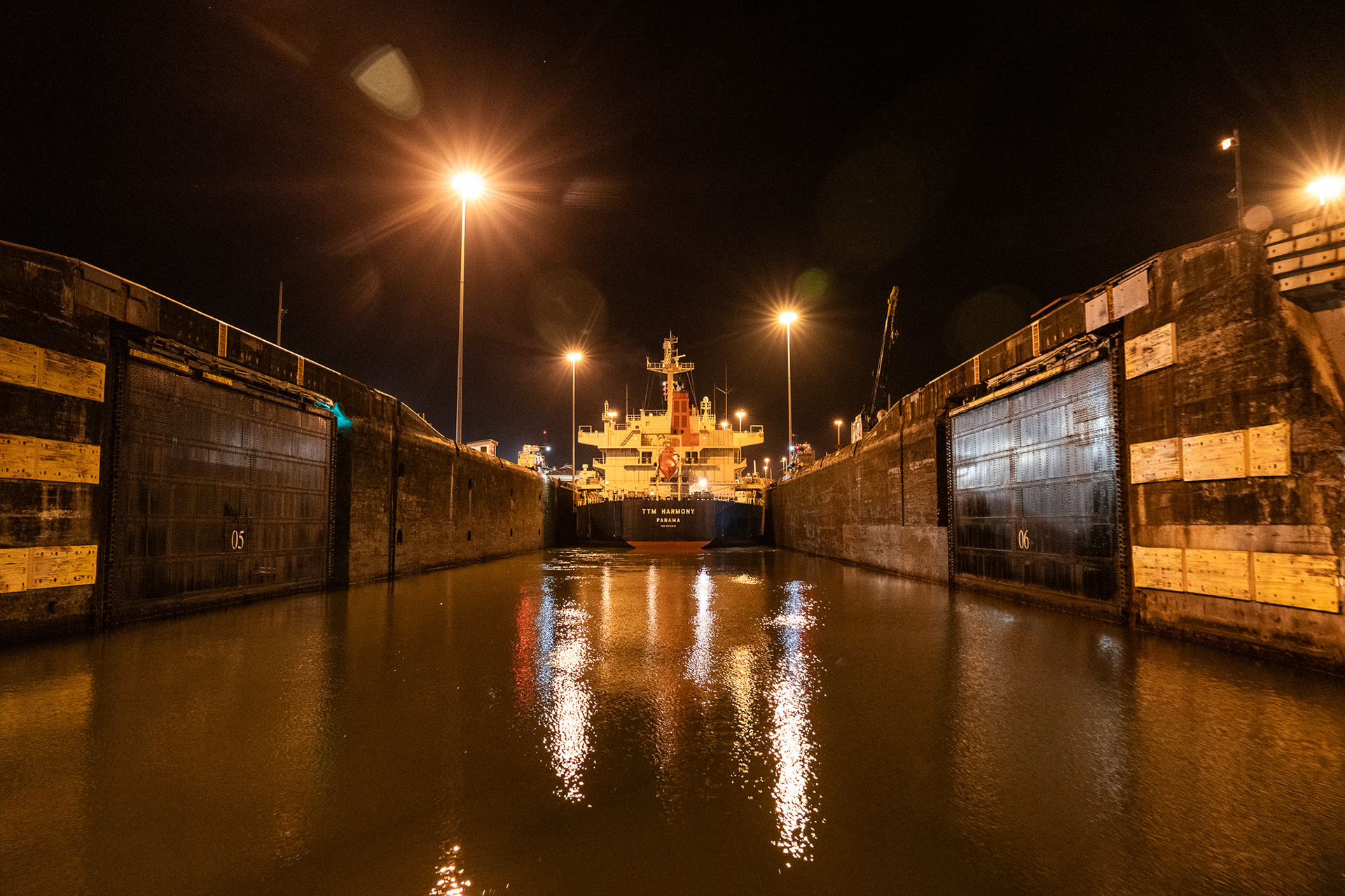 Crossing the Panama Canal under the evening sky was an unforgettable experience while gaining experience on a fellow sailor's boat