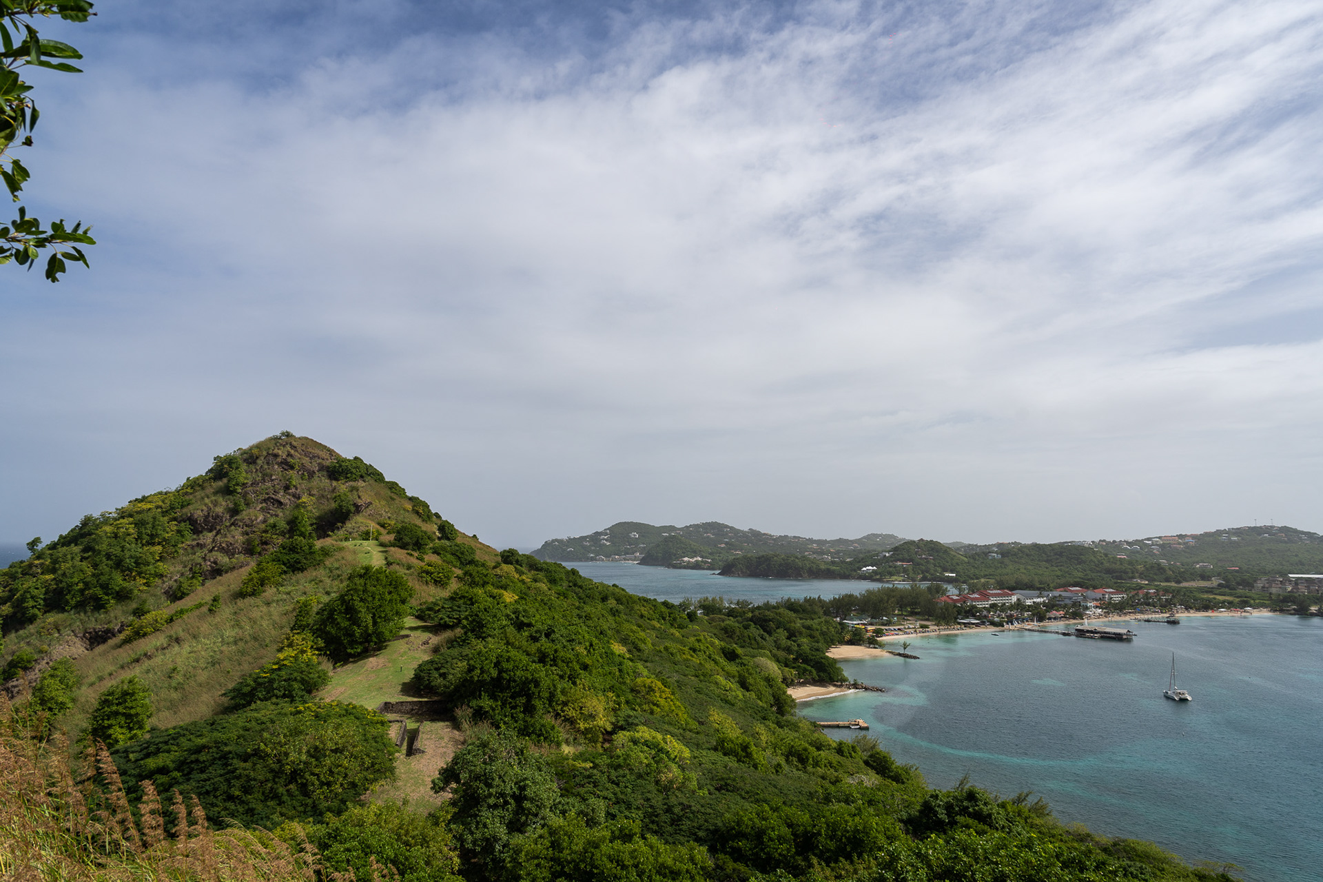 Pigeon point, with the man-made landmass connecting it to the main island