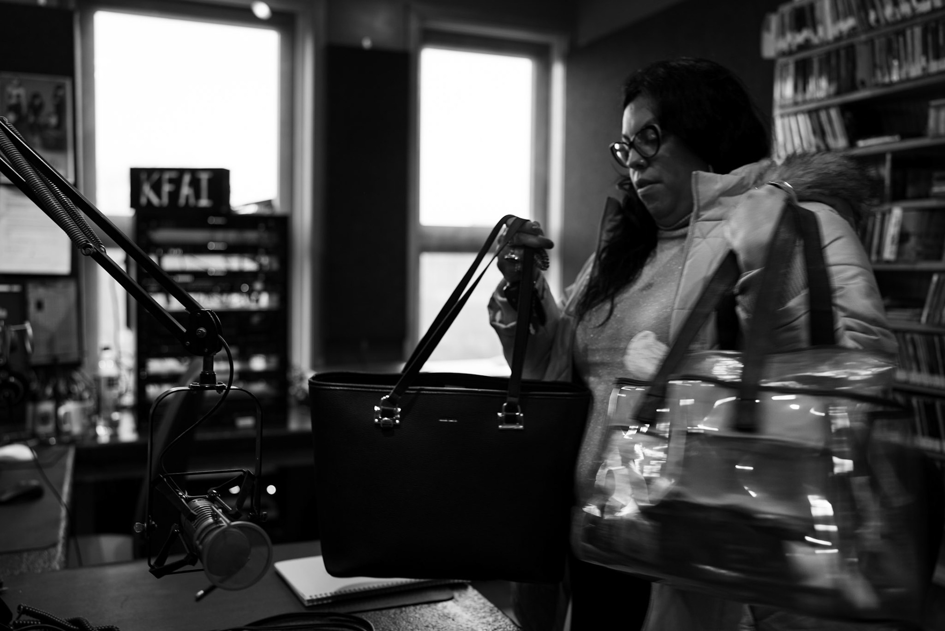 As the sun rises, Quinn transfers power over to a pre-recorded show, grabs her bags, and we head back out into the alley.