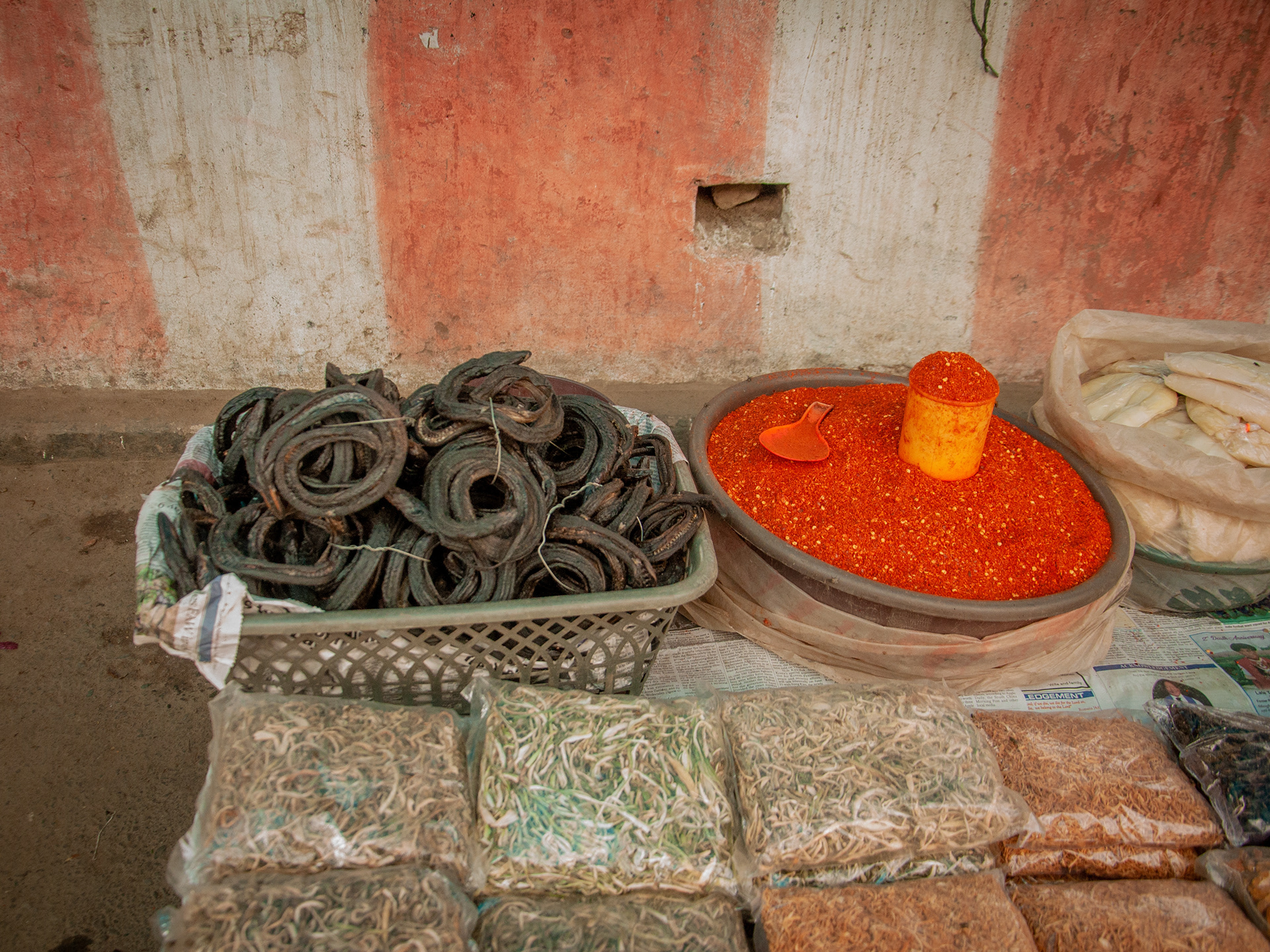 Dried Eels being sold alongside Naga-King Chilly Powder.