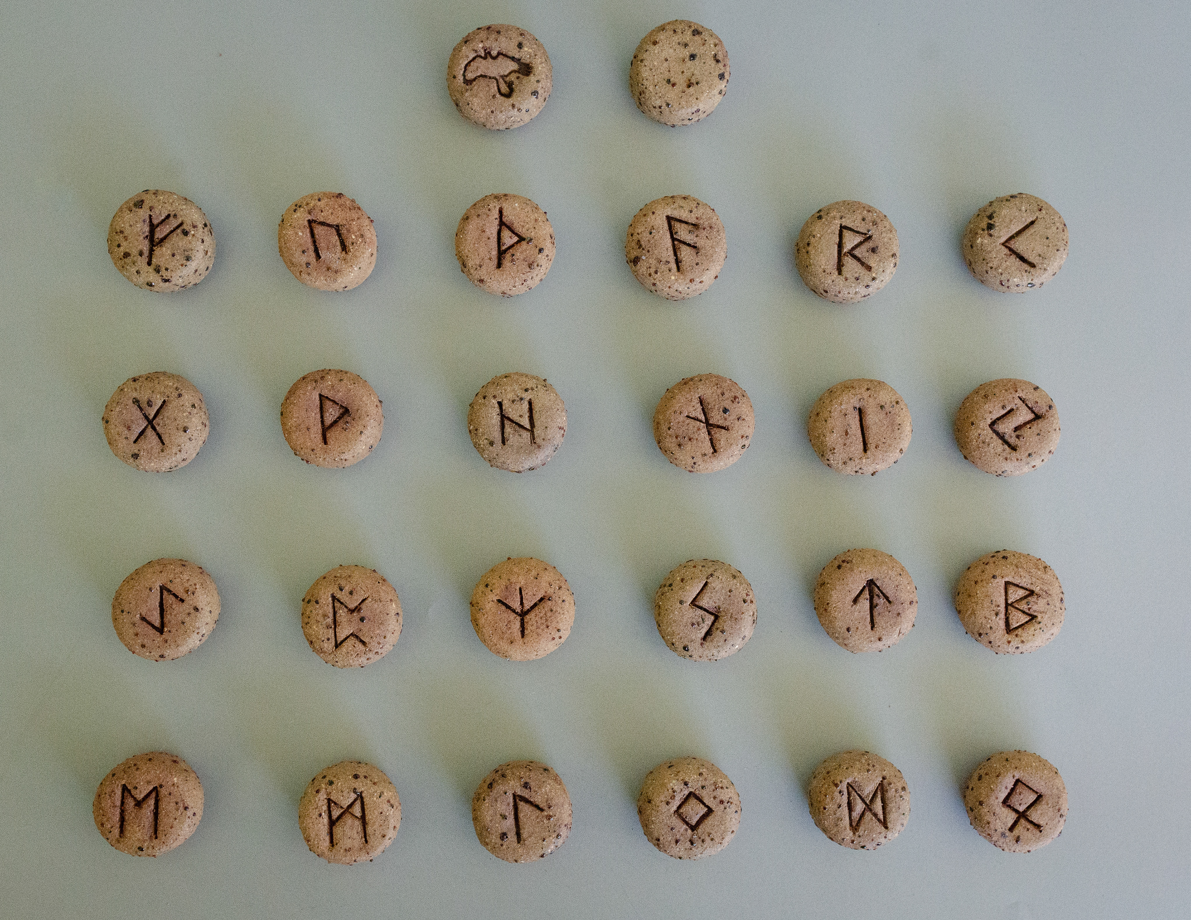 Elder Futhark Rune Stones & Raven stone (2024) Buff Raku Trachyte with Red Iron Oxide 2cm (W) x 1cm (H)