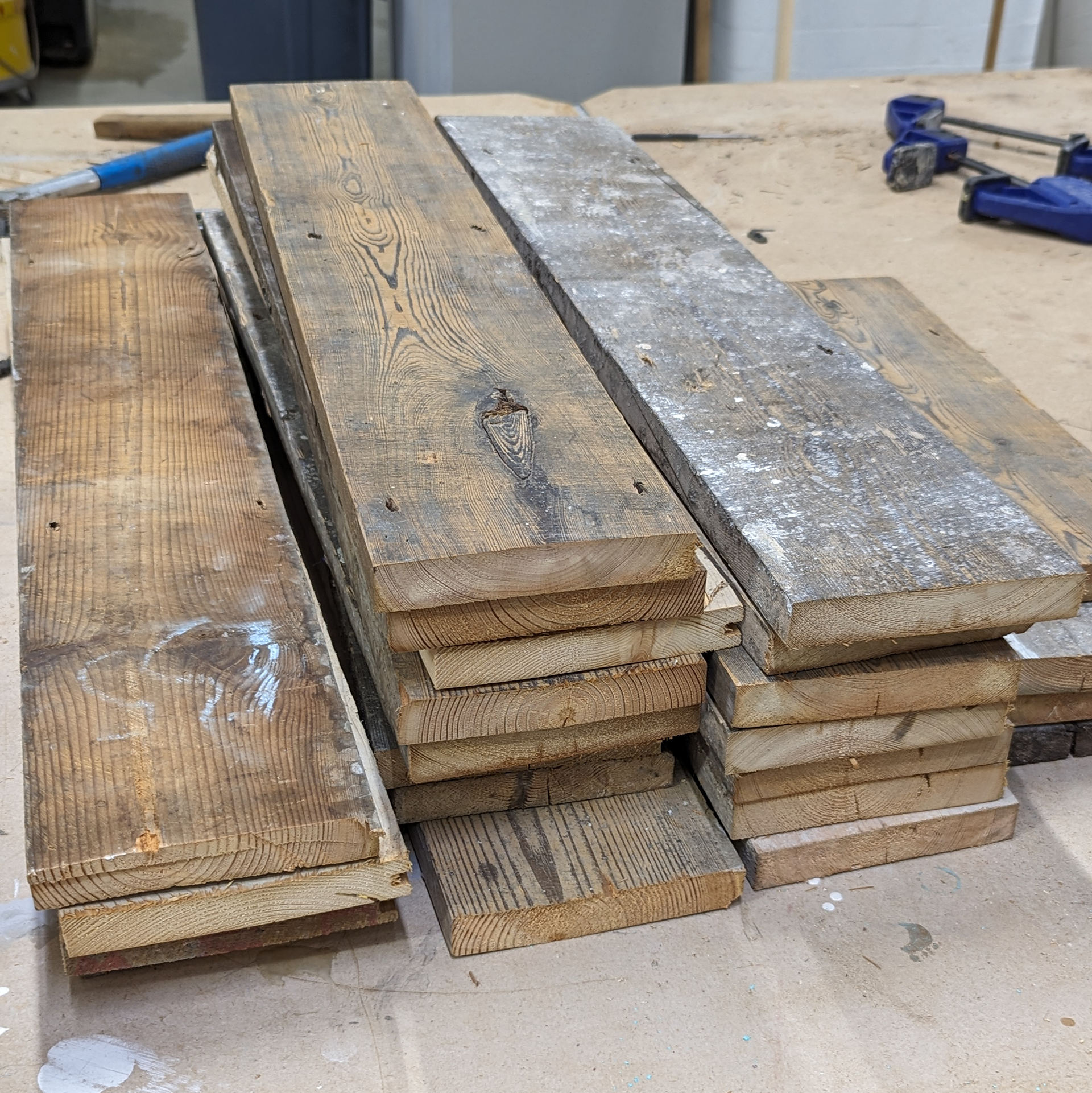 Floor board processing: This involved de-nailing, cutting down to size and then planing.