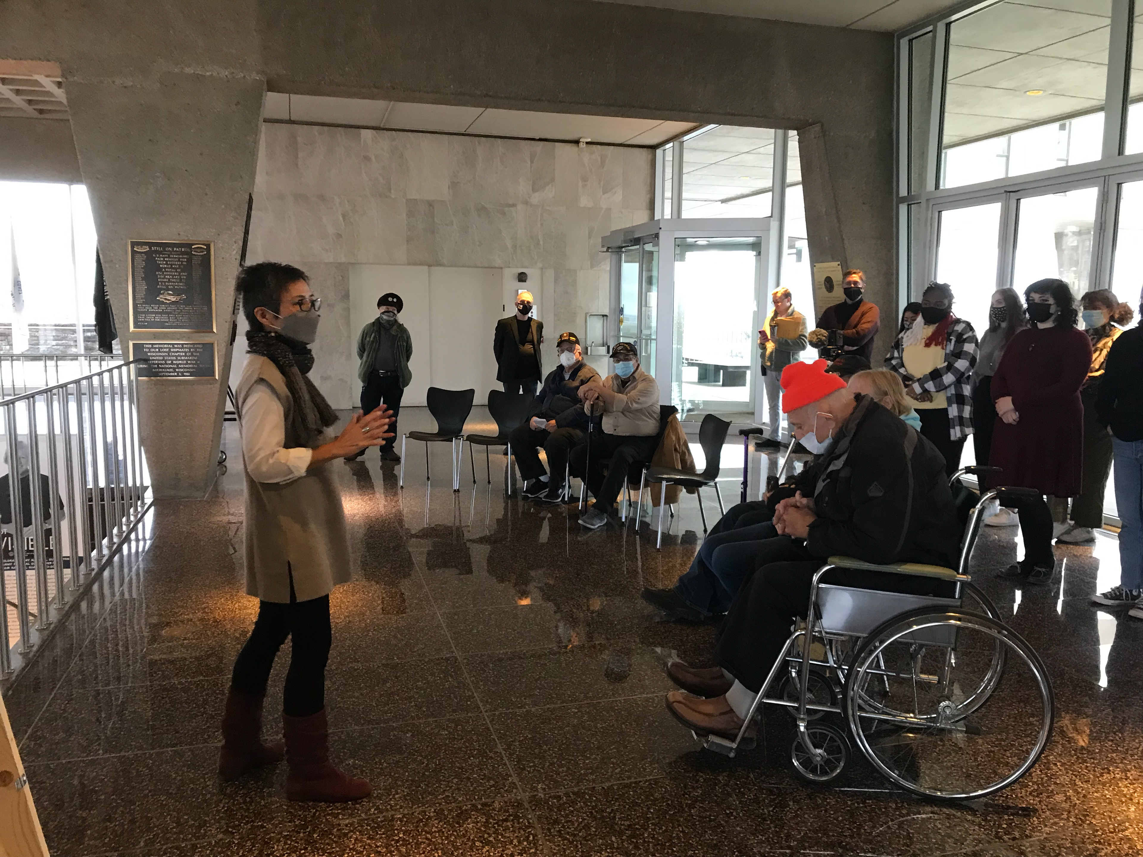 Professor Rina Yoon speaks to VPP participants at the 20221 VPP print reveal event held at Milwaukee War Memorial.