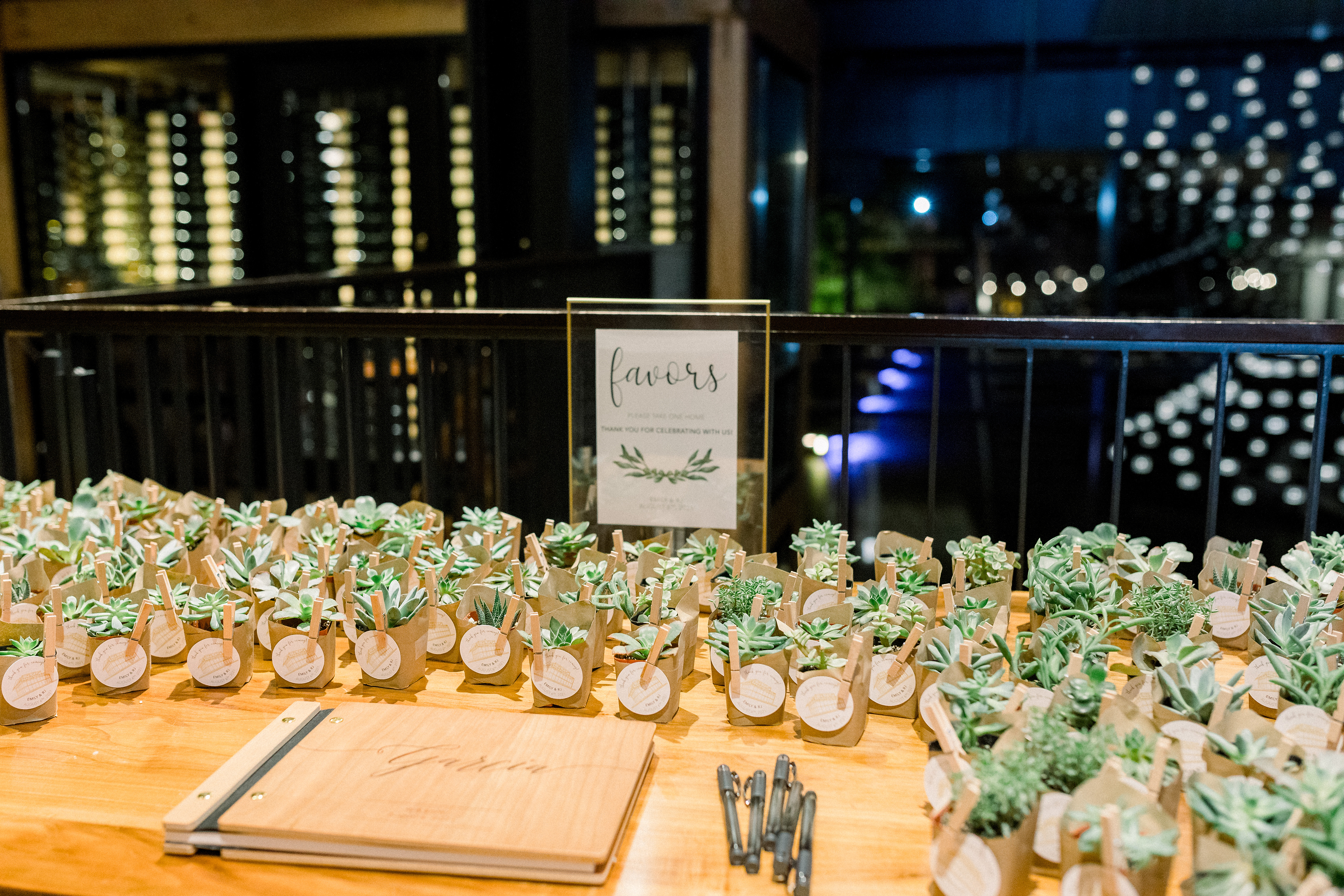 Designed and hand wrapped succulent pots with personalized "thank you" notes.