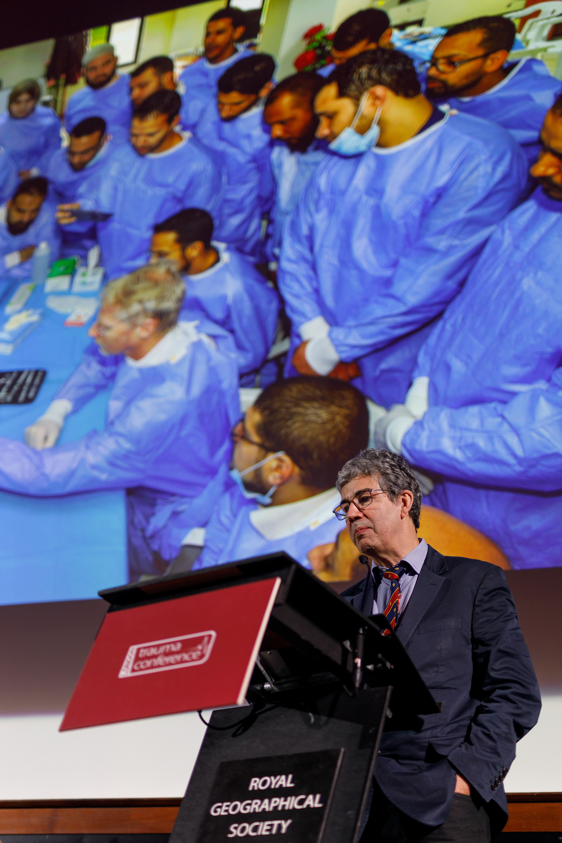 Dr  David Nott (OBE OStJ FRCS) delivering a talk at London Trauma Conference 2022