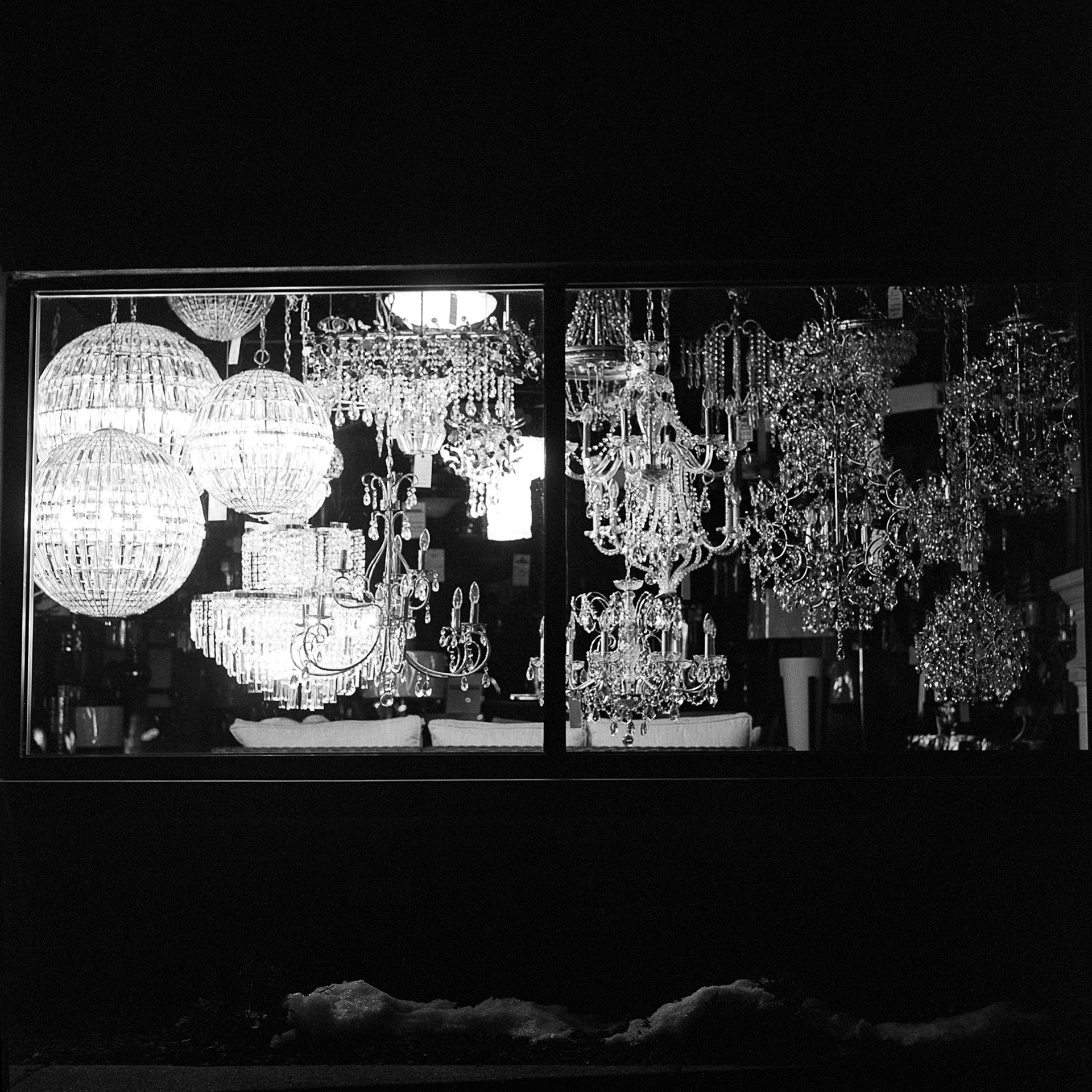 Light fixture store window at night with snow. The seond pint for Photo2 class project Five Senses.
#ISU#Sight#photo2#120#film#bw