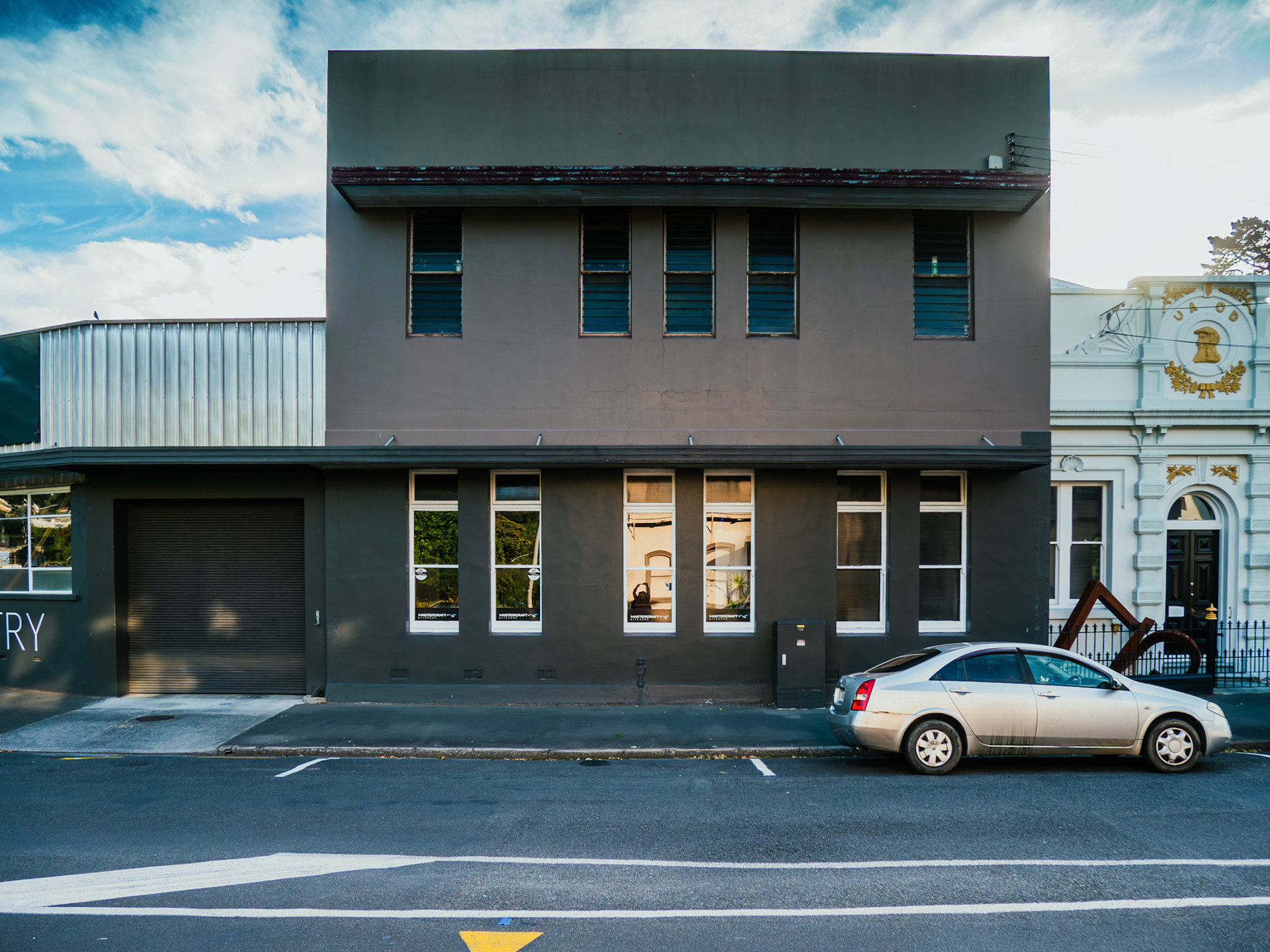 Arms up to the bird & bottle at the former ballroom