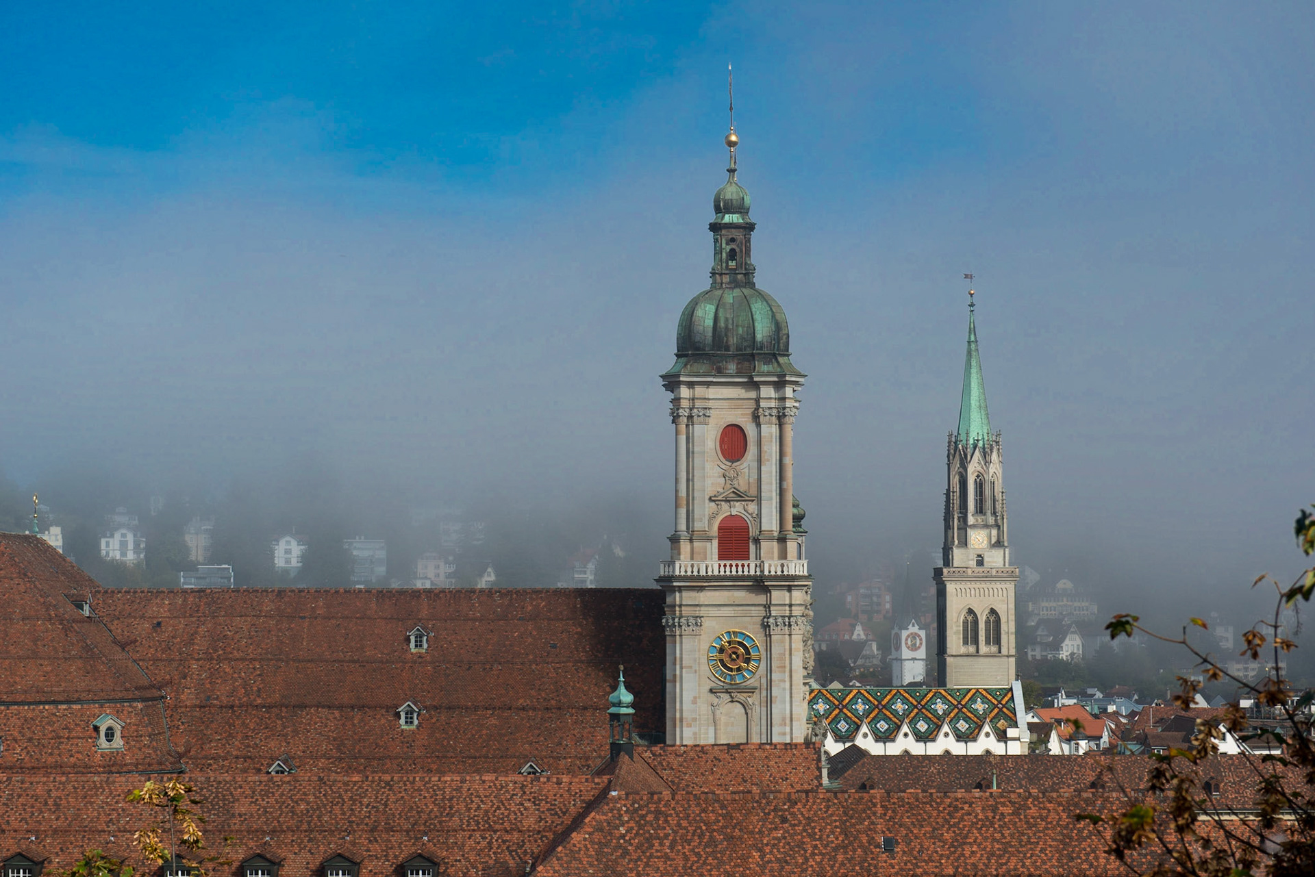 cathedral of St. Gallen, Switzerland, and Stadtkirche St. Laurenzen in the early morning hours, shortly after sunrise.