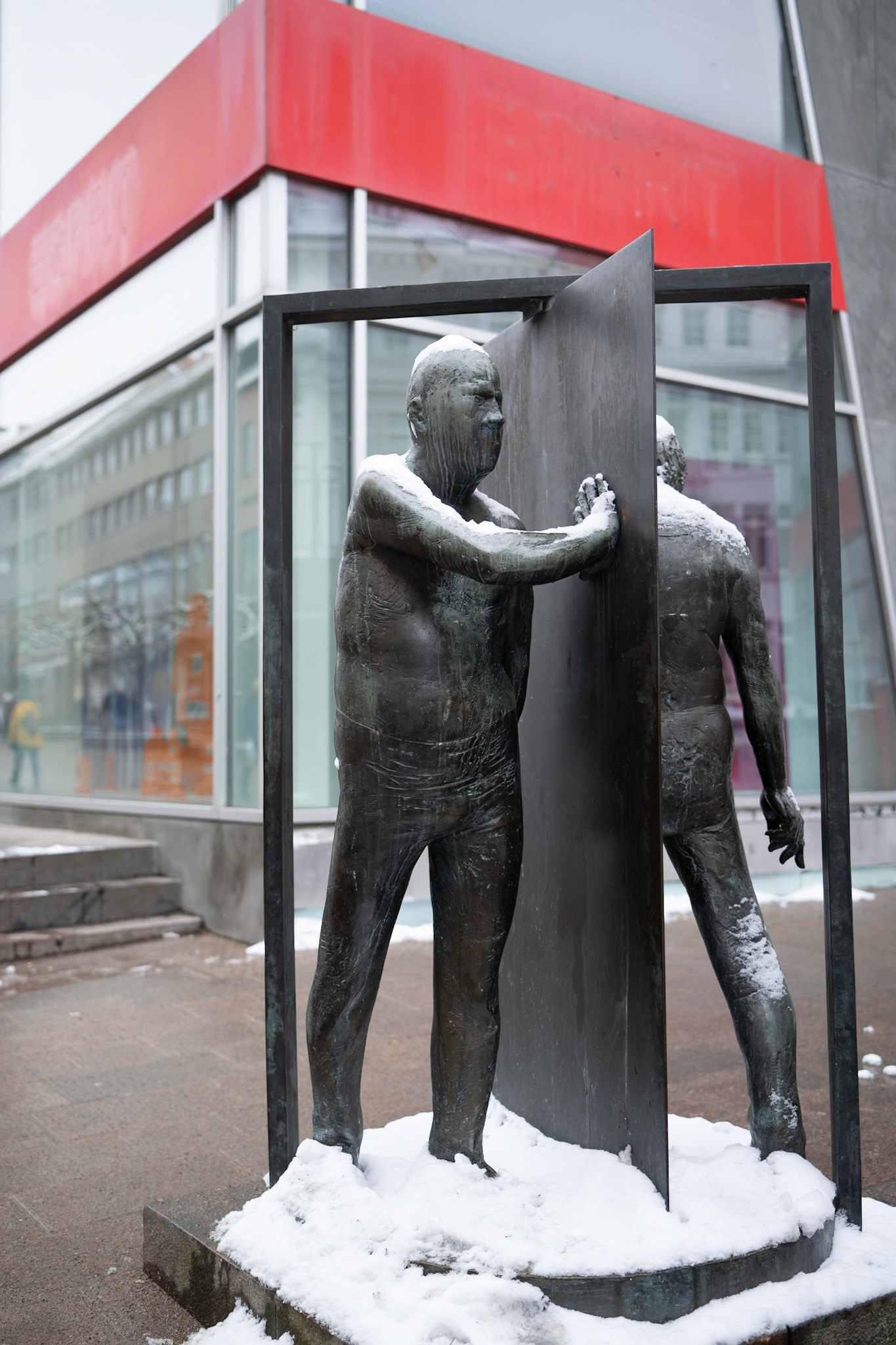 "Man in Revolving Door" by Waldamar Otto