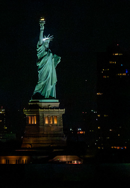 QM2 passing Statue of Liberty on arrival New York