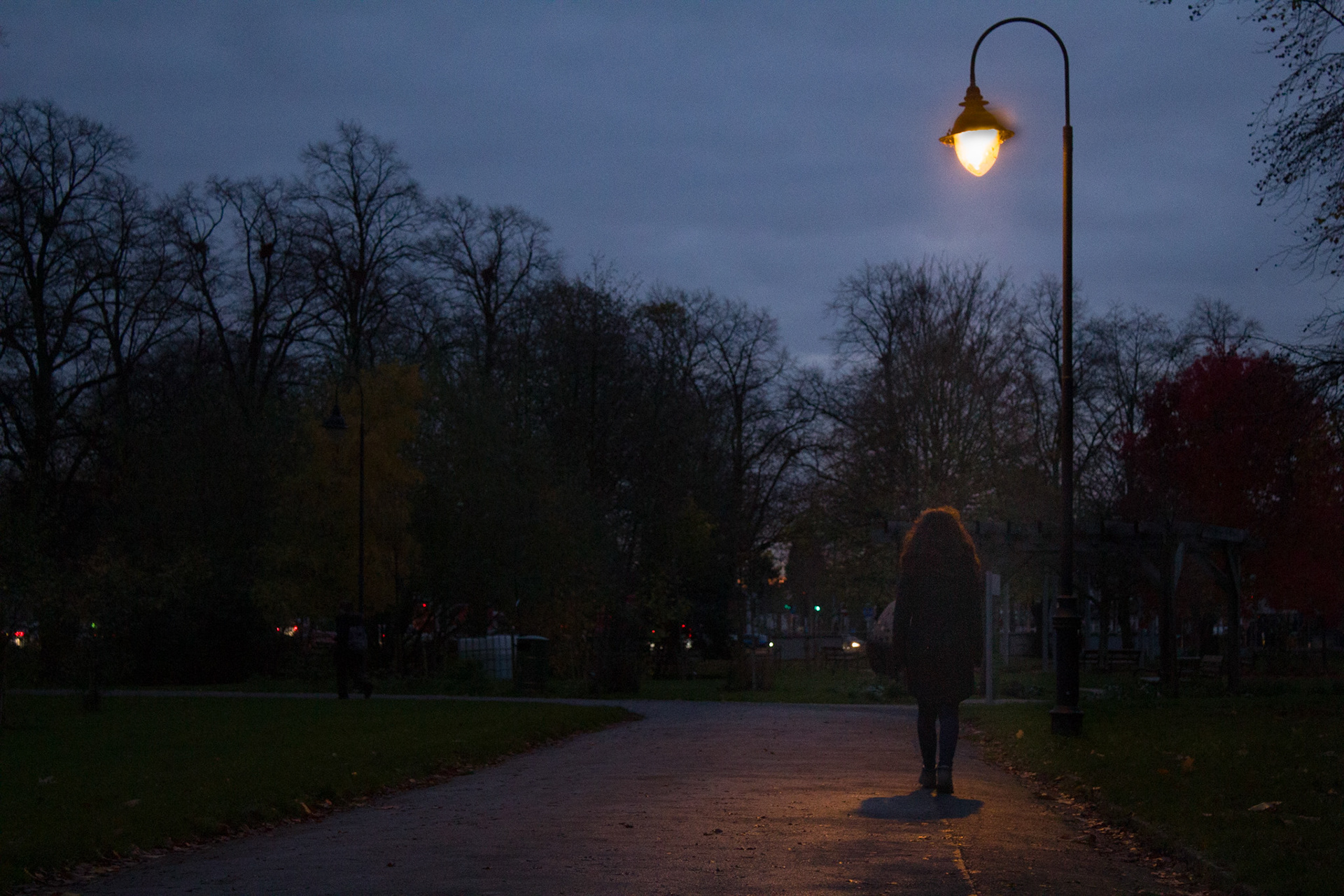 A Dark Morning - the image shows a character's lonely walk to the garden supported by lighting.