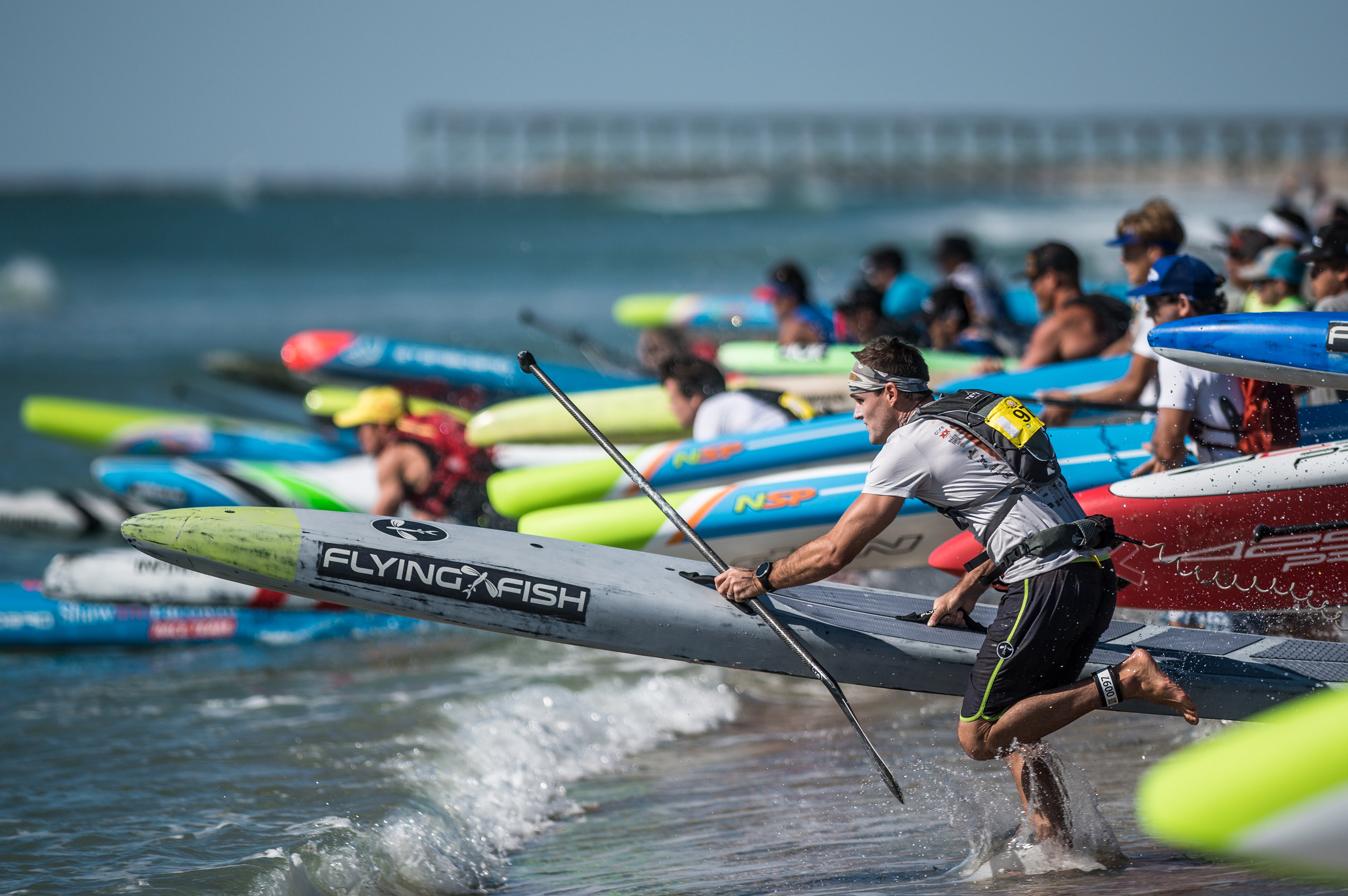 Contestants kick off the 13.2 mile Graveyard Elite Race during the 2019 Carolina Cup on Saturday April 27, 2019 in Wrightsville Beach, N.C.