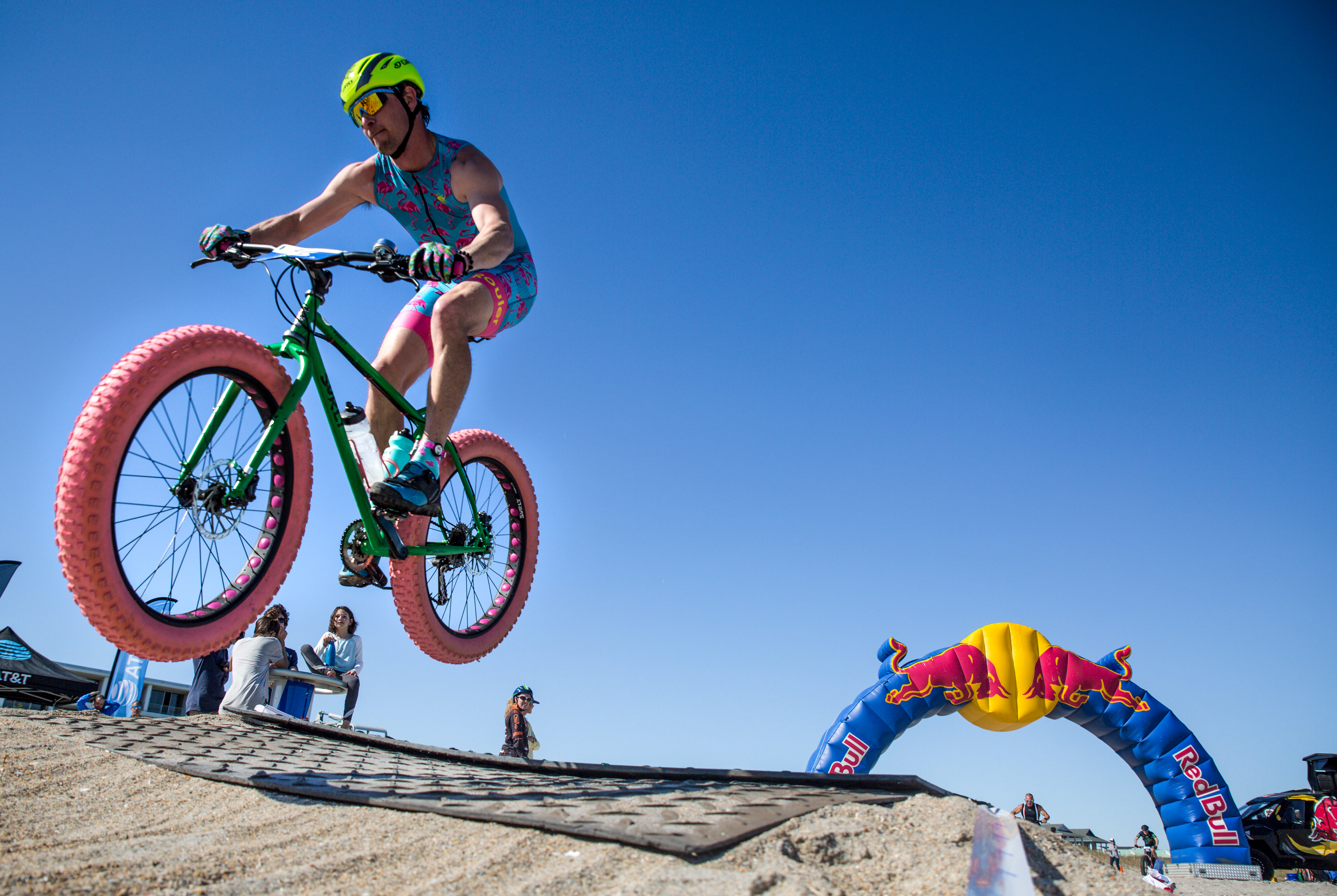 A cyclist catches air during the 2019 US Open Fat Bike Beach Championship at the Blockade Runner Beach Resort in Wrightsville Beach, NC, on Saturday, March 23, 2019.