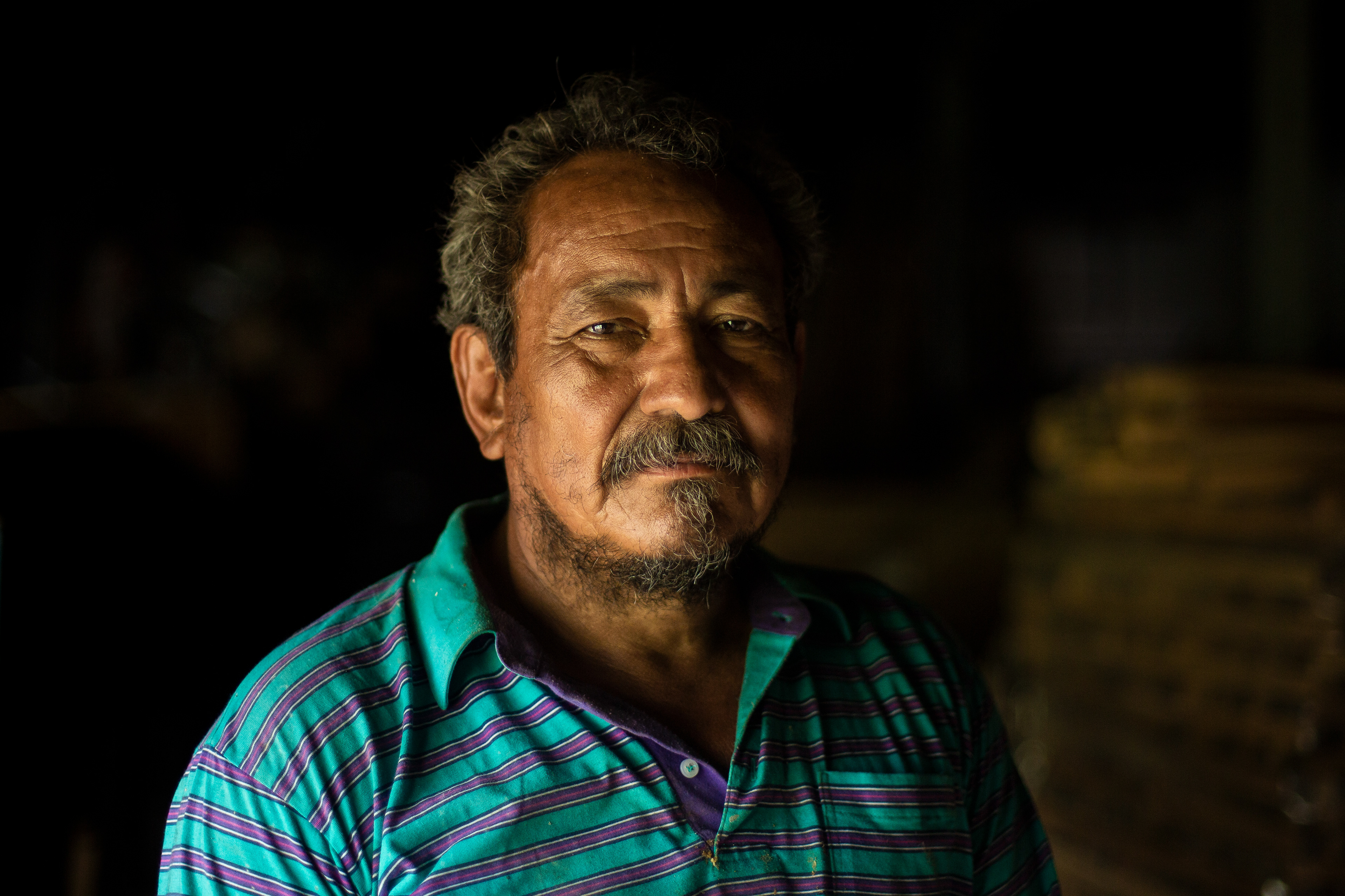 Antonio Lima, who immigrated to the United States from Guatemala thirteen years ago, collects unfinished stools from an abandoned furniture warehouse to finish and sell in Asheboro, N.C.  When rain prevents Lima from going to work at a concrete company, he will often walk over to the soon-to-be destroyed warehouse, where Lima searches for partially constructed stools that he will finish, and sell for profit.
