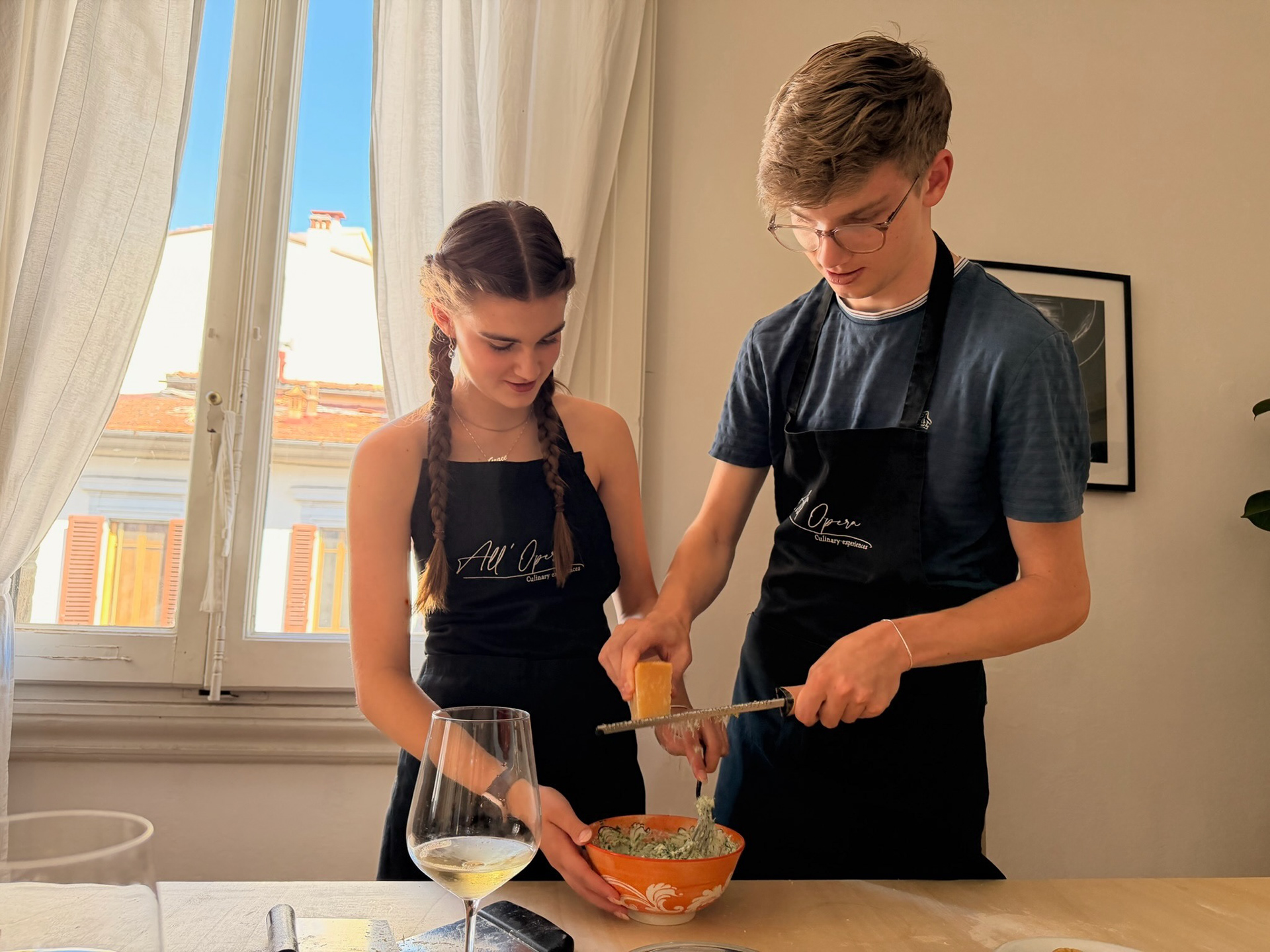 Grace added lemon zest and Nate's adding Parmigiano Reggiano