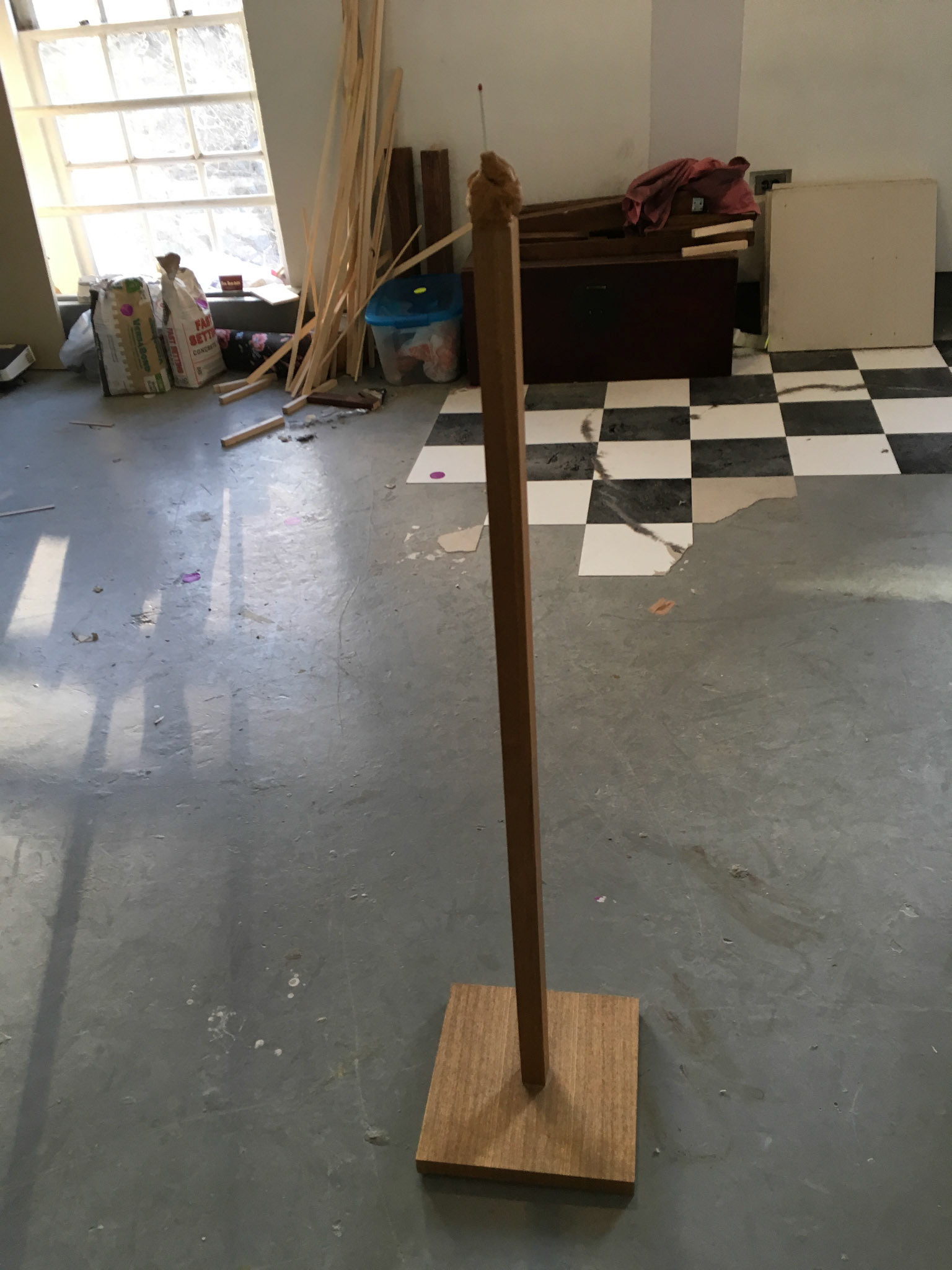 Austin Abistado and Austin Fickel, Untitled, 2017. Wood, clay, plaster, red paint.