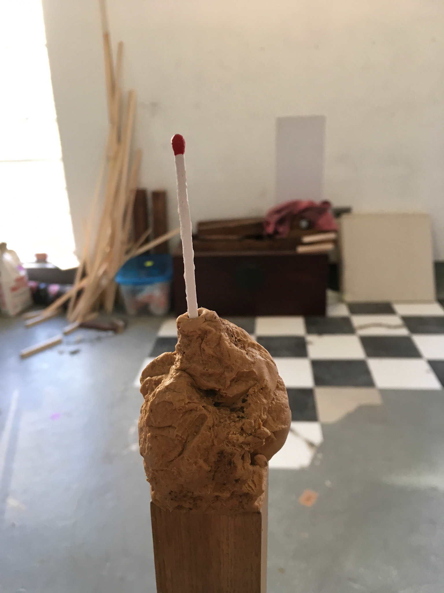 Austin Abistado and Austin Fickel, Untitled, 2017. Wood, clay, plaster, red paint.