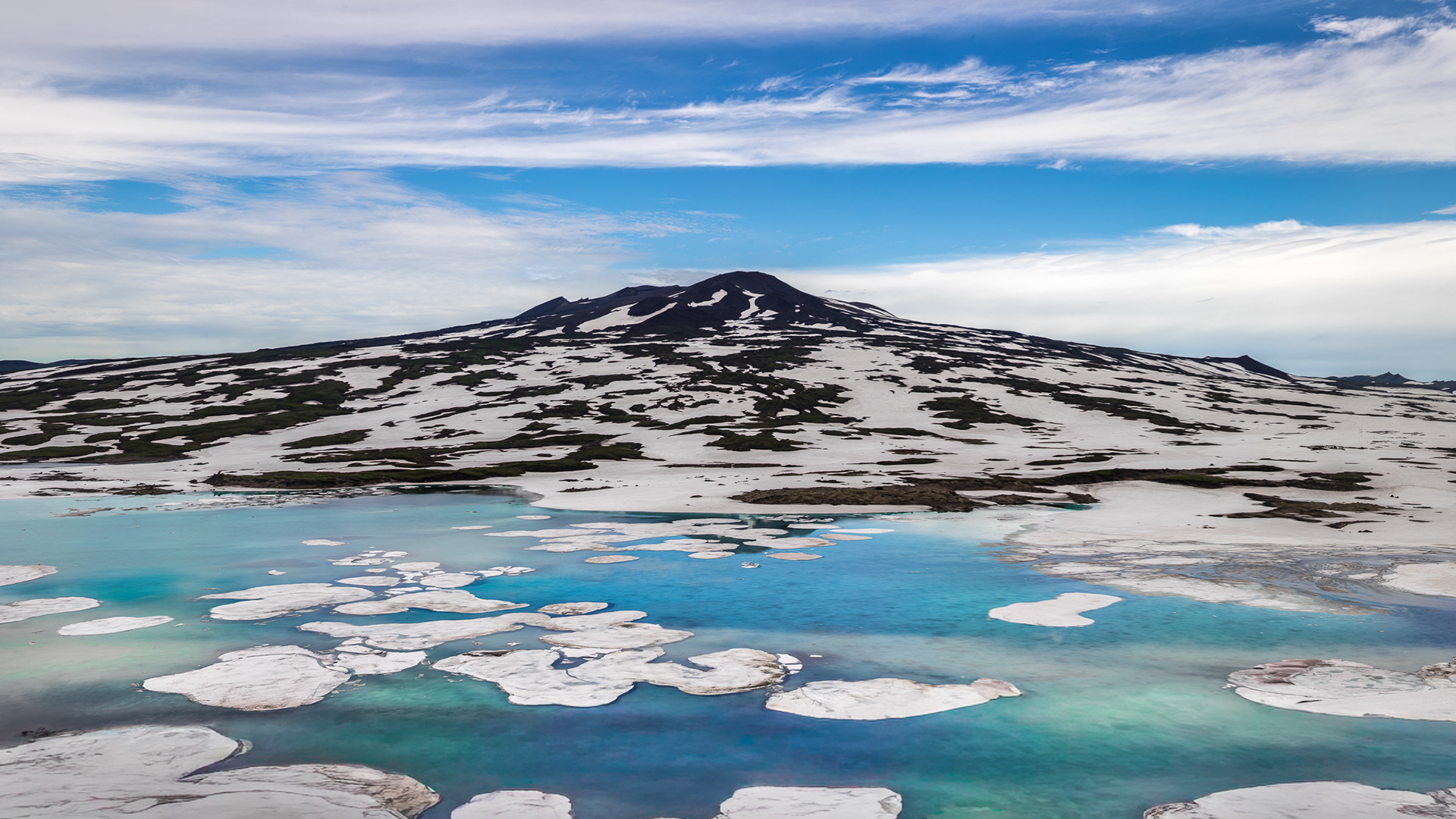 Karymsky Volcano, located in the Eastern Volcanic Zone of Kamchatka, Russia.
