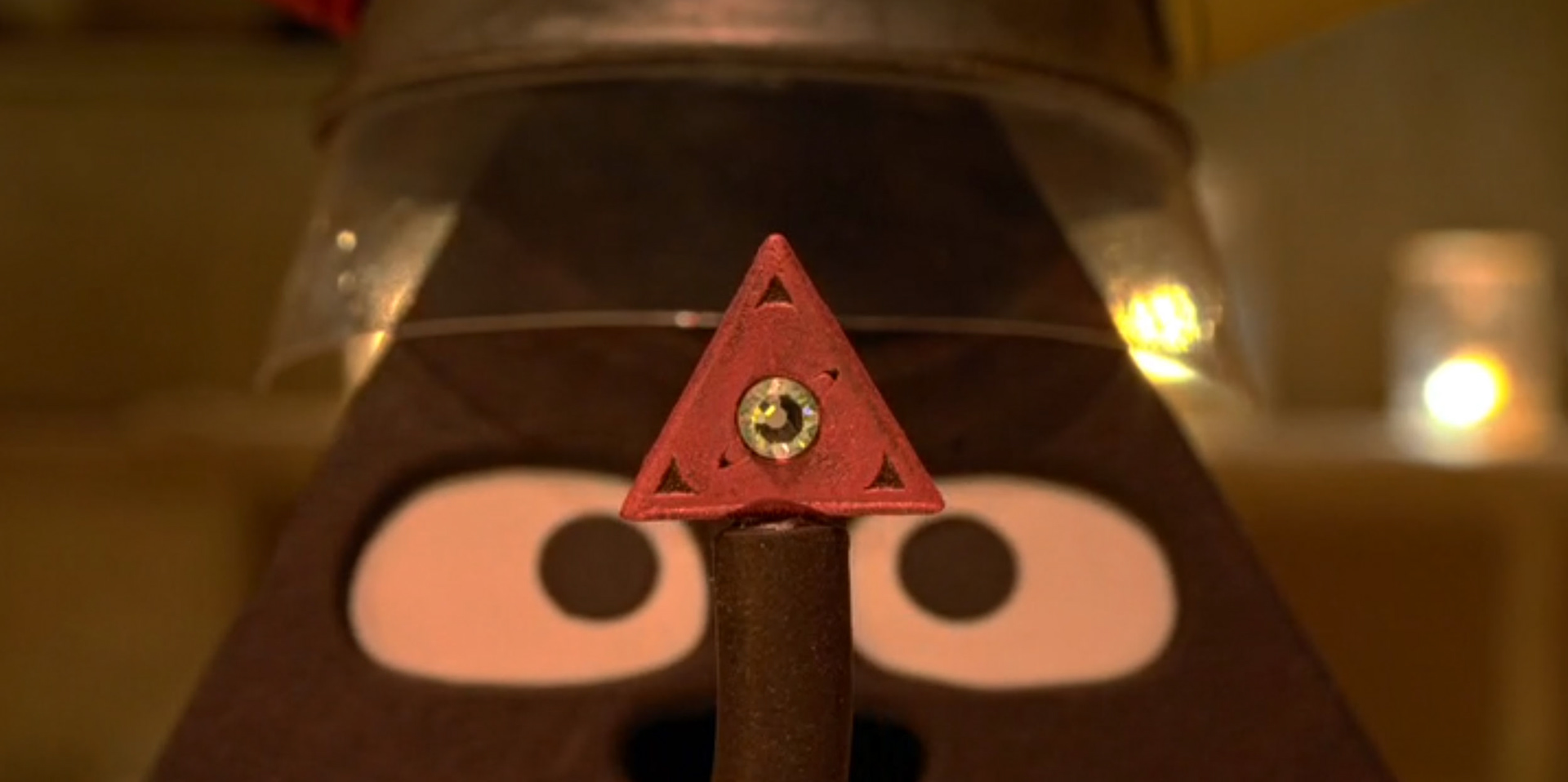 Triangle with token - movie still