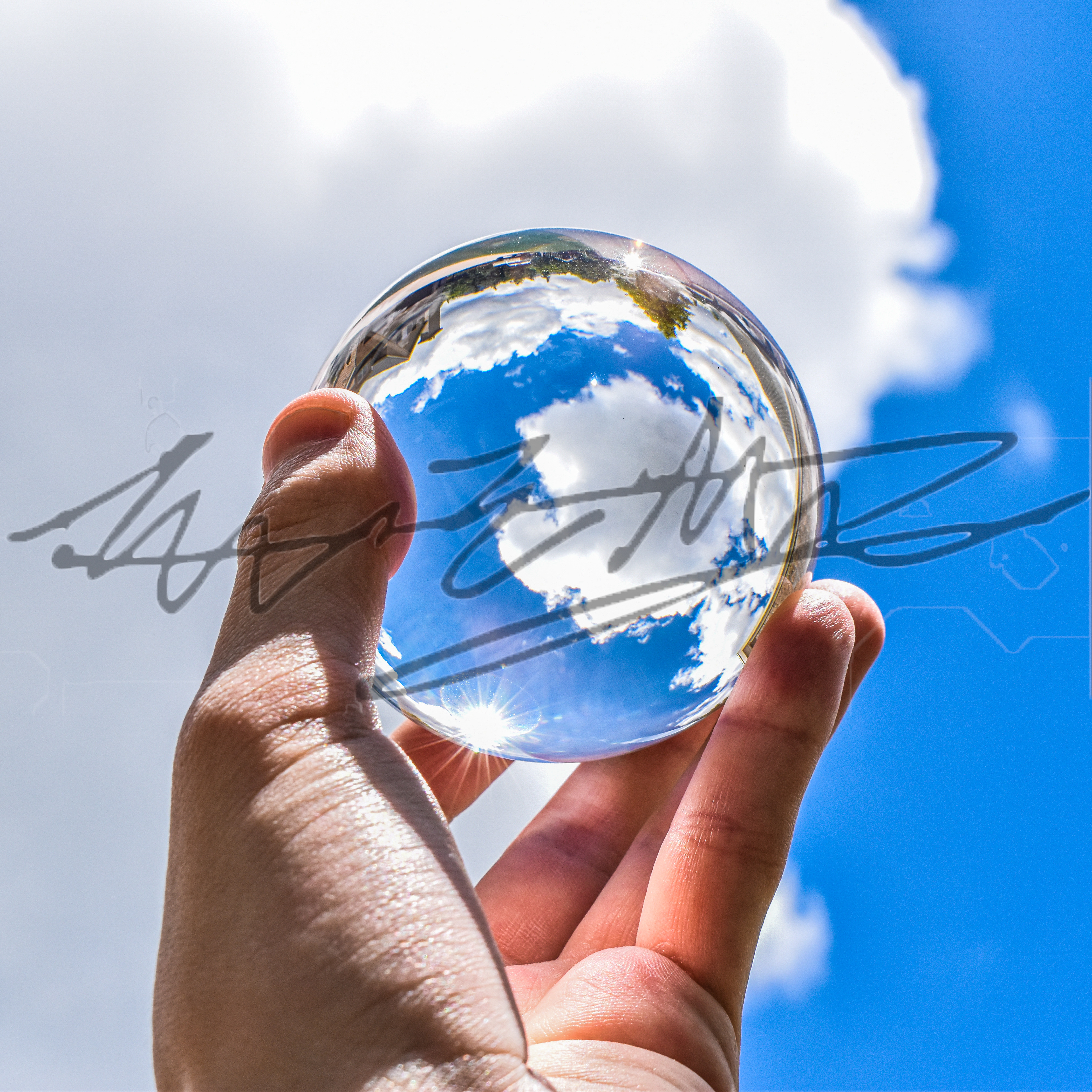 "Clouds, Sky, and a Glass Ball"