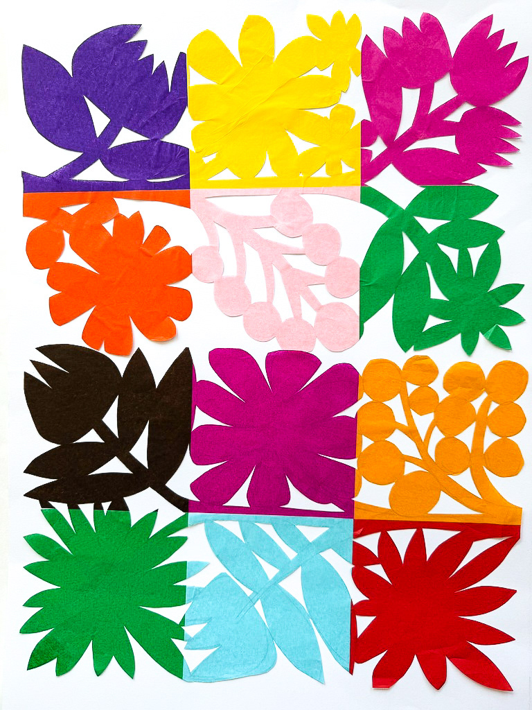 Cut-outs of flowers on colourful tissue paper inspired by Mexican folk art.