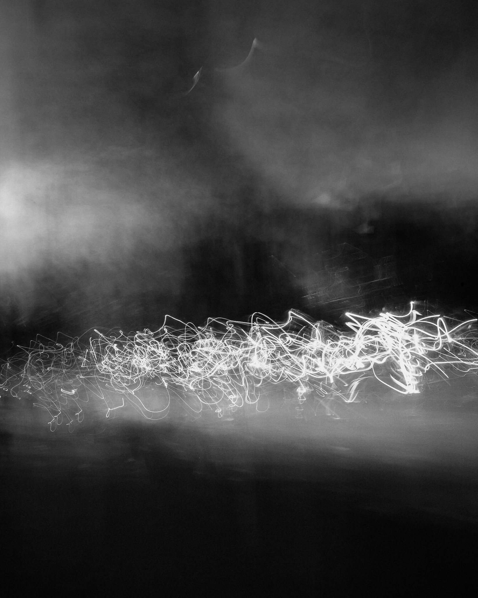 Dark clouds gather, lightning opens cracks