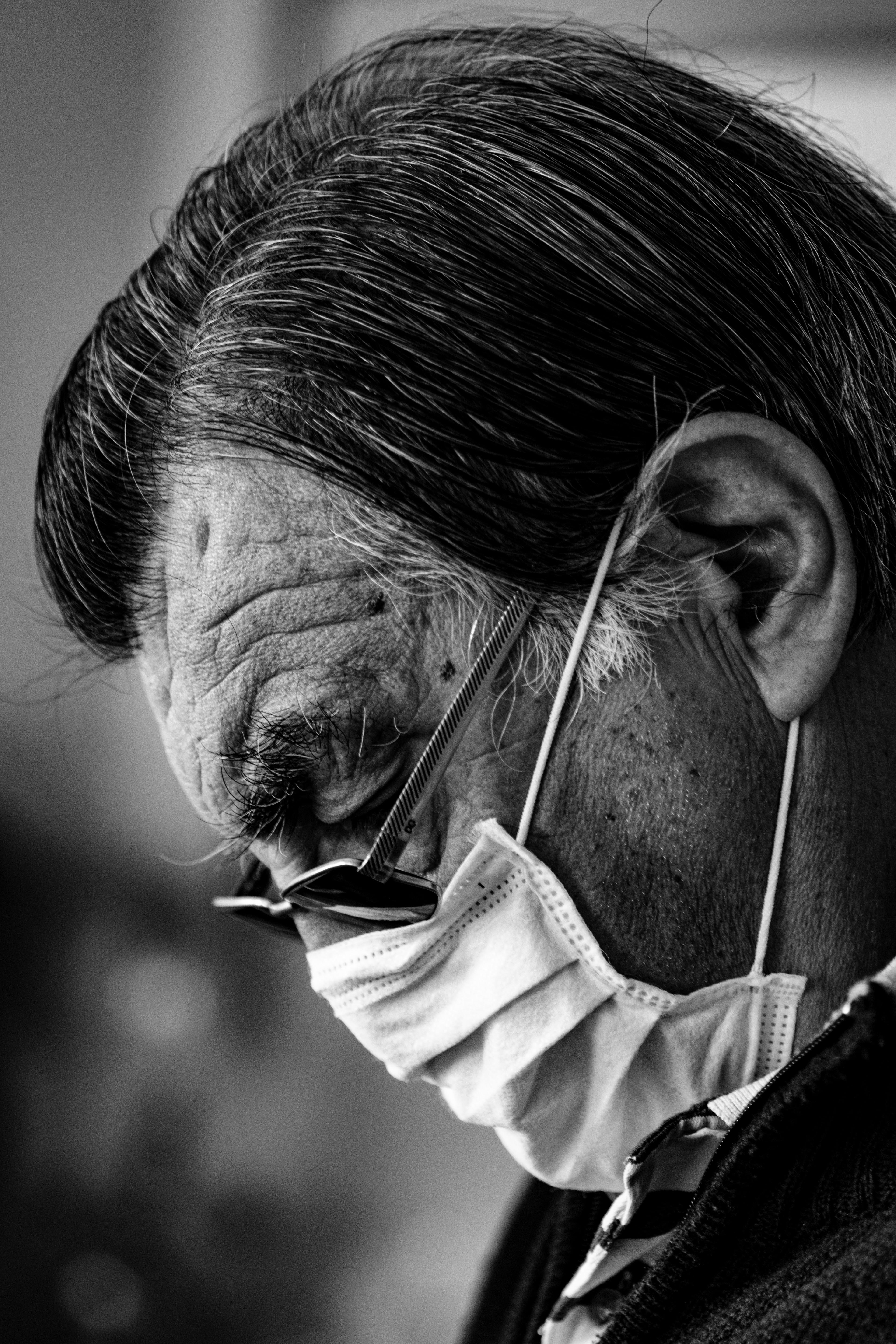 This picture is the one that inspired the whole project. This is my grandfather fighting his phone, trying to learn how to use it as the pandemic changed the way he used to work. This picture is not part of the project, it does not look the same, but it is the one that raised the question and started this last months of work.