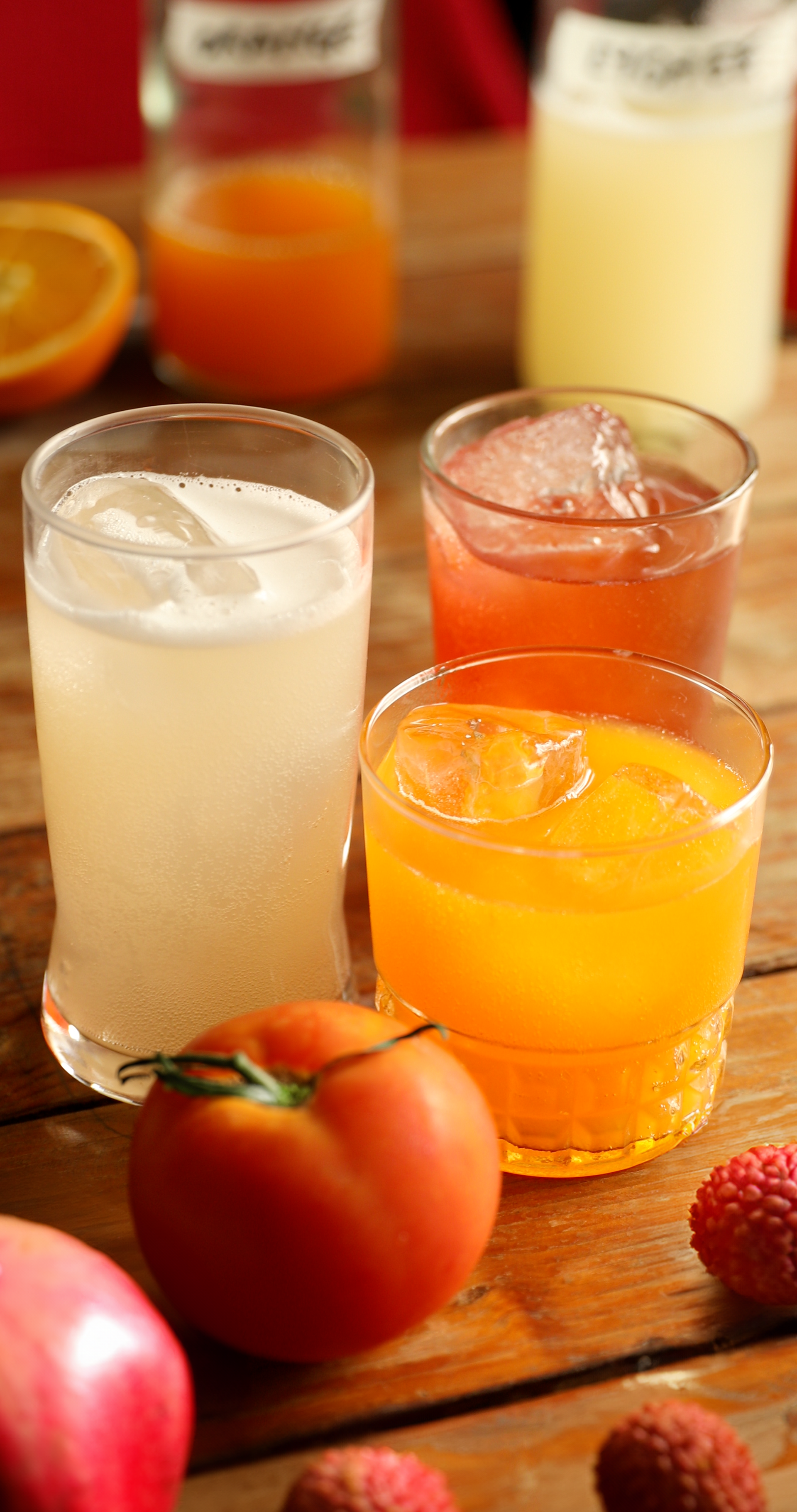 Ginger bug with lychee, orange, pomegranate and tomato