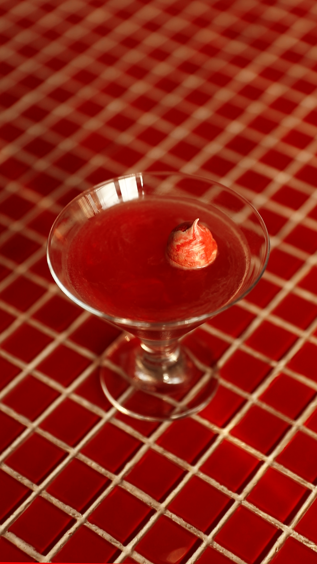 Hibiscus gin float with meringue kiss