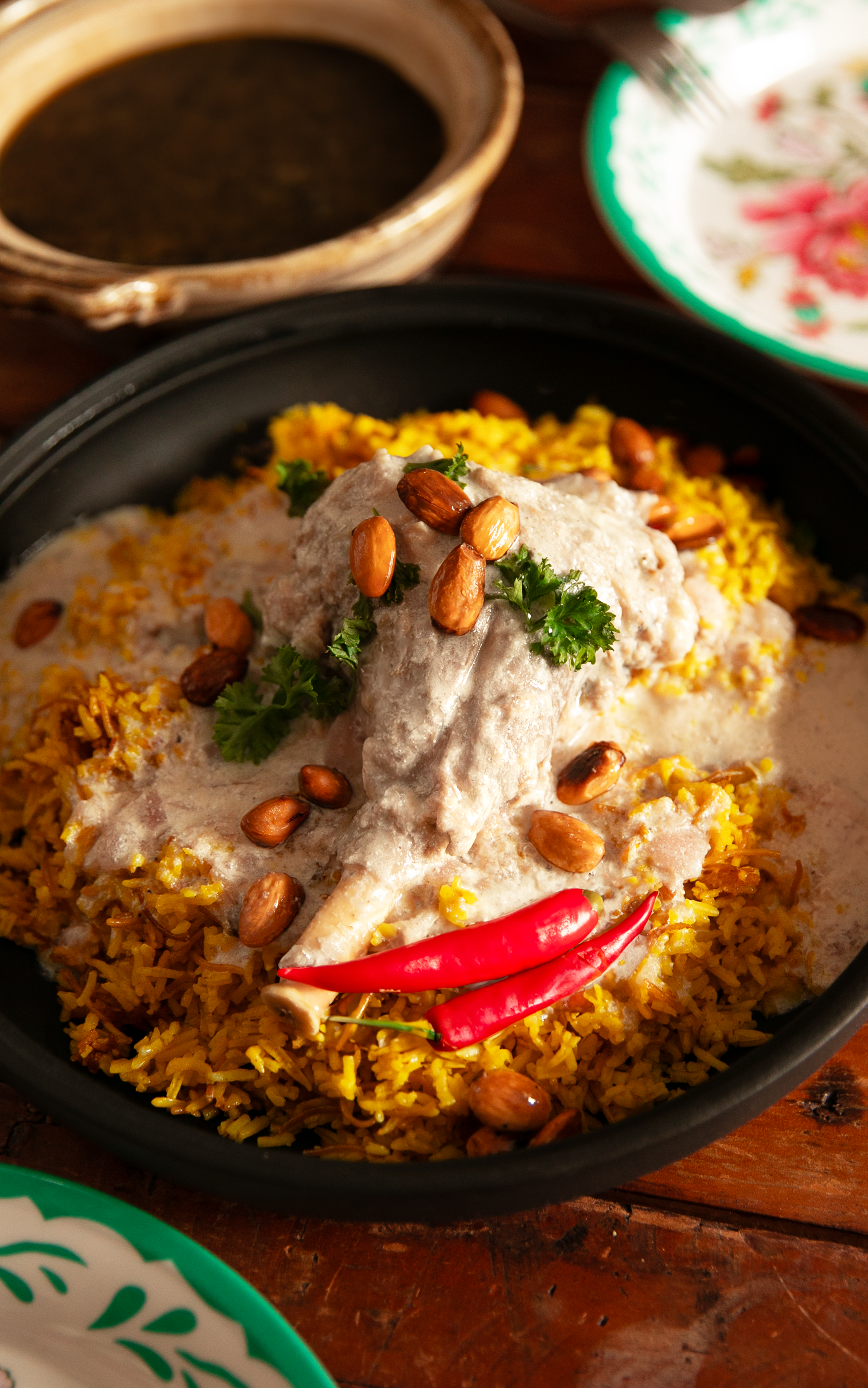Mansaf - National dish of Jordan, a traditional meal consisting of tender lamb cooked in a rich, tangy sauce made from fermented, dried goat's milk yogurt (jameed).