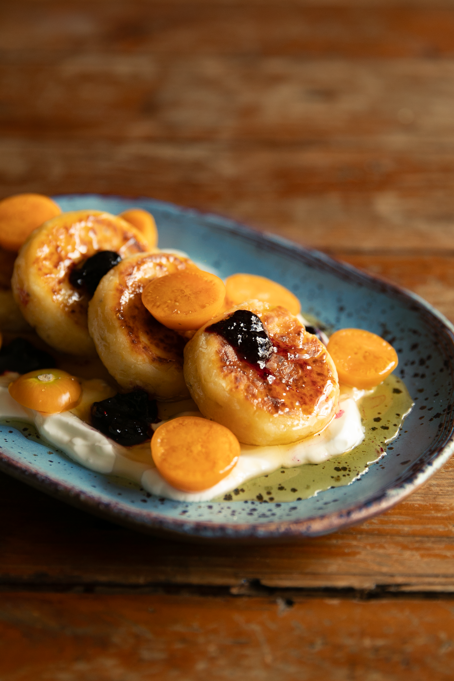 Syrniki - Fluffy, slightly sweet cottage cheese pancakes. Crispy outside, soft inside.