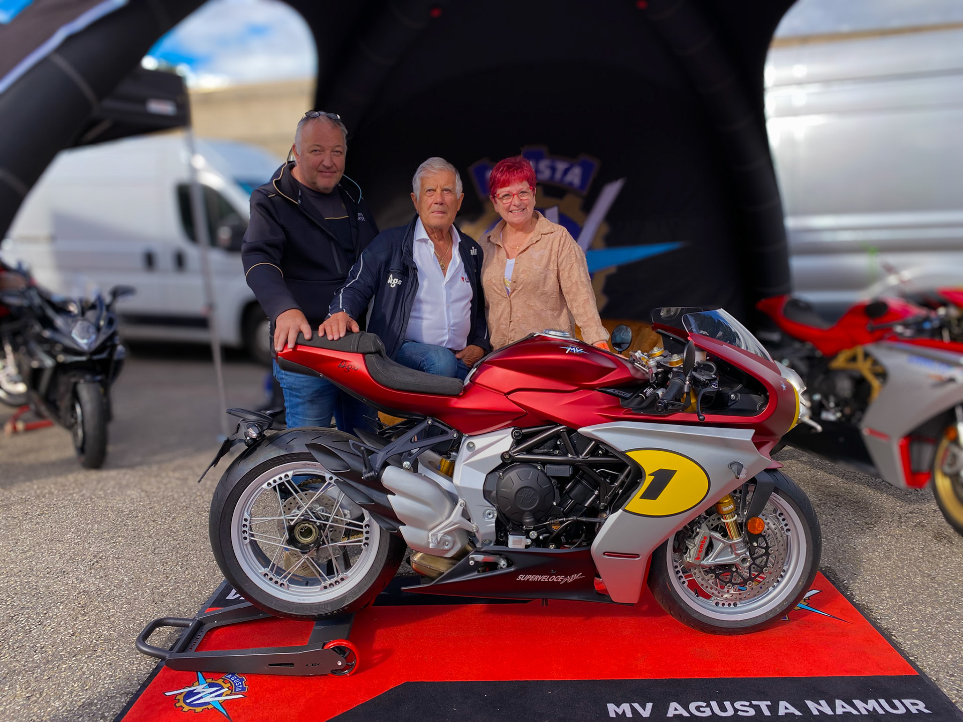 Giacomo Agostini with the owners of MV Agusta Namur