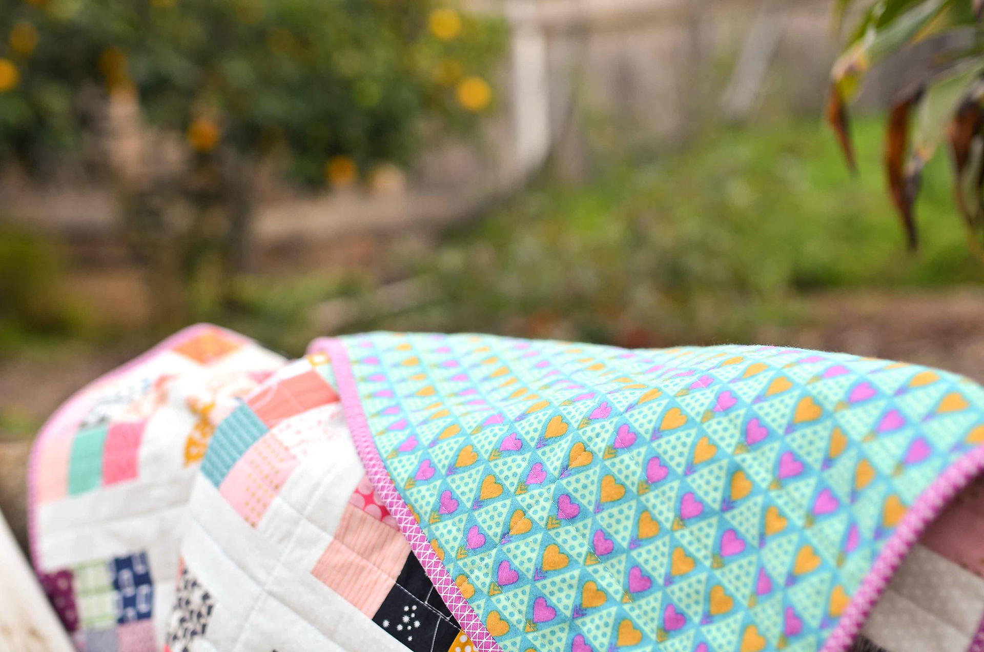 Scrappy Postage Stamp Baby Quilt - Kitchen Table Quilting