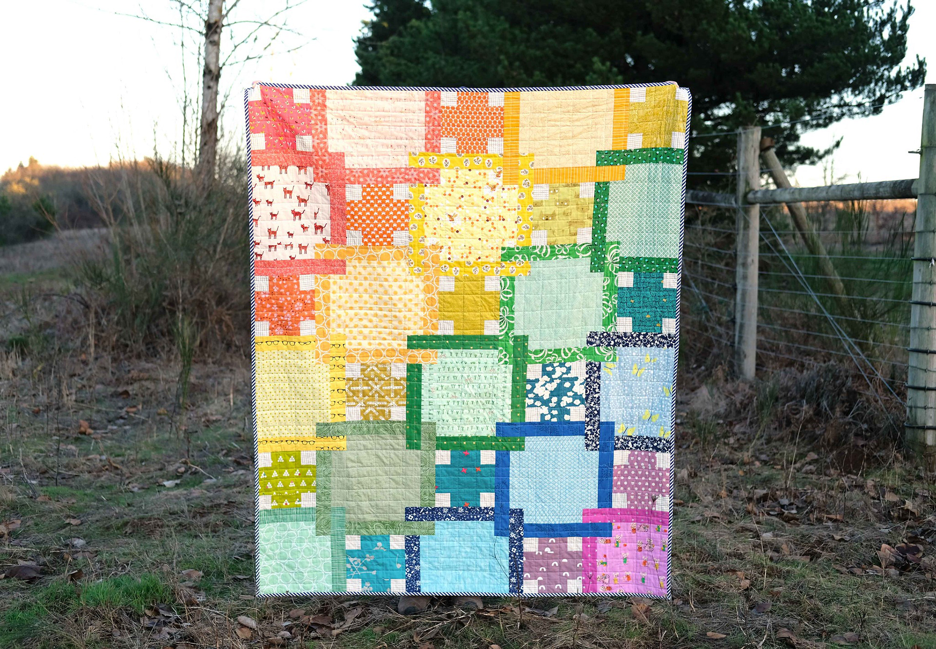 A Scrappy, Rainbow Judy Quilt - Kitchen Table Quilting