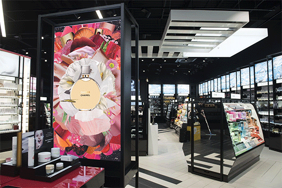 Mockup Collage is seen on screen in a cosmetic store