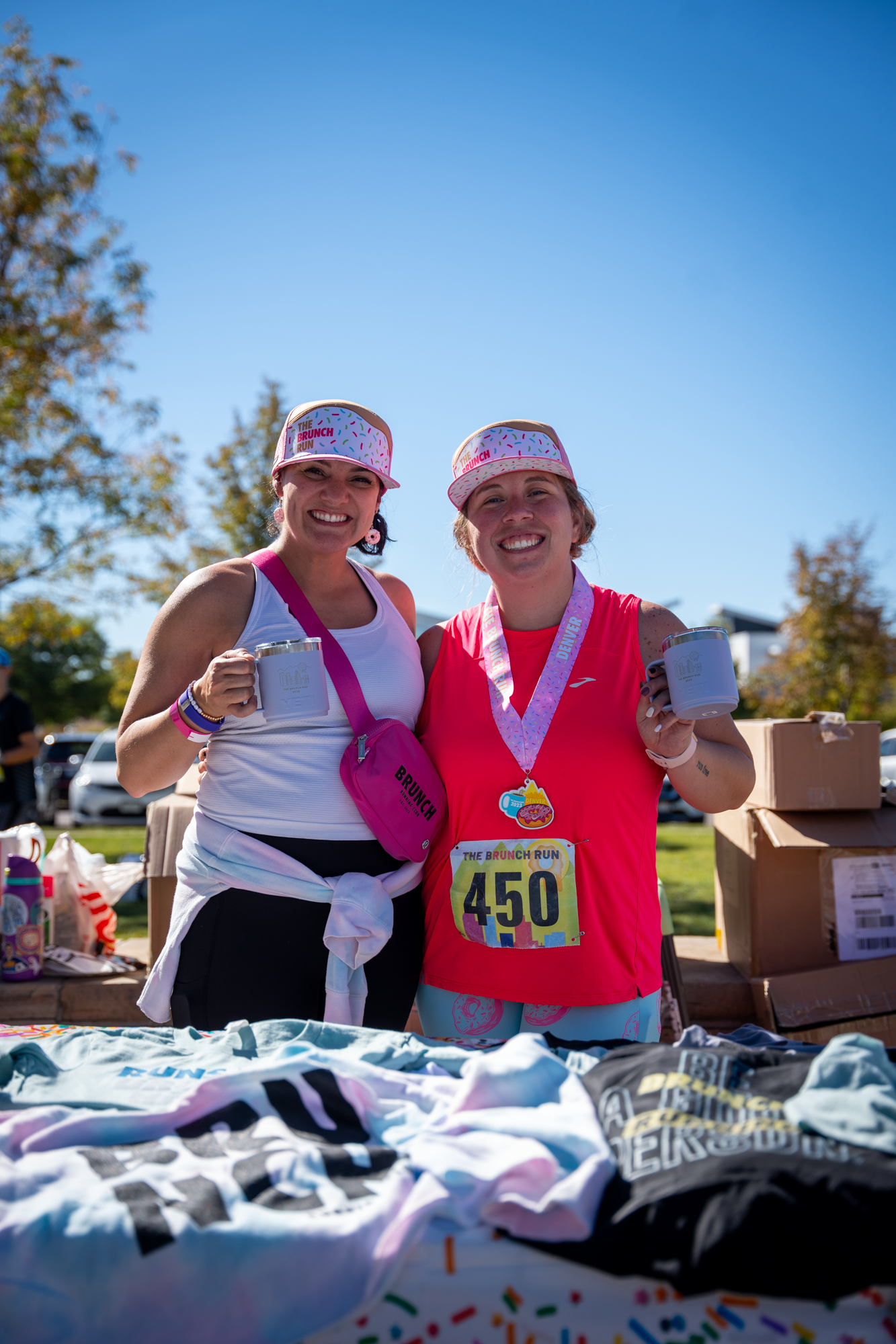 race bibs, medals and mugs