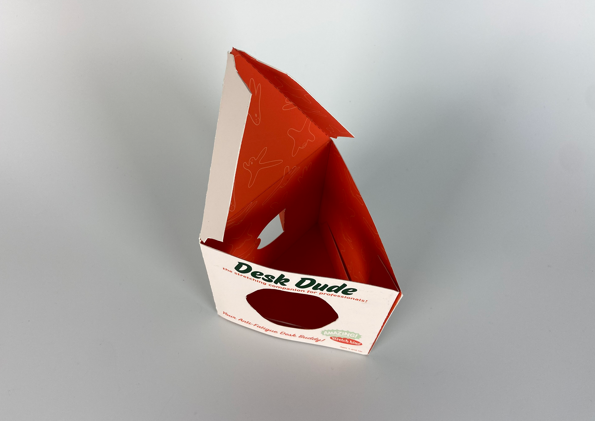 a top view of the packaging that shows a bright orange pattern inside